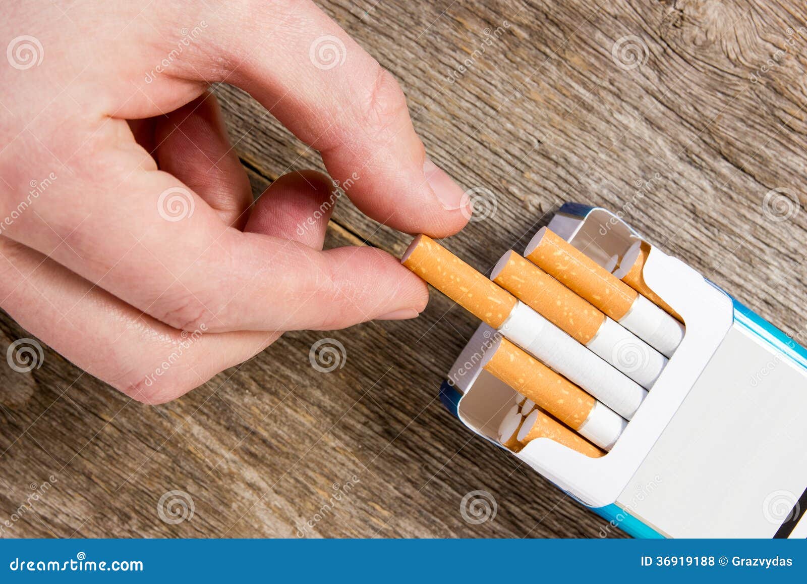 Hand takes a cigarette stock photo. Image of addiction 36919188
