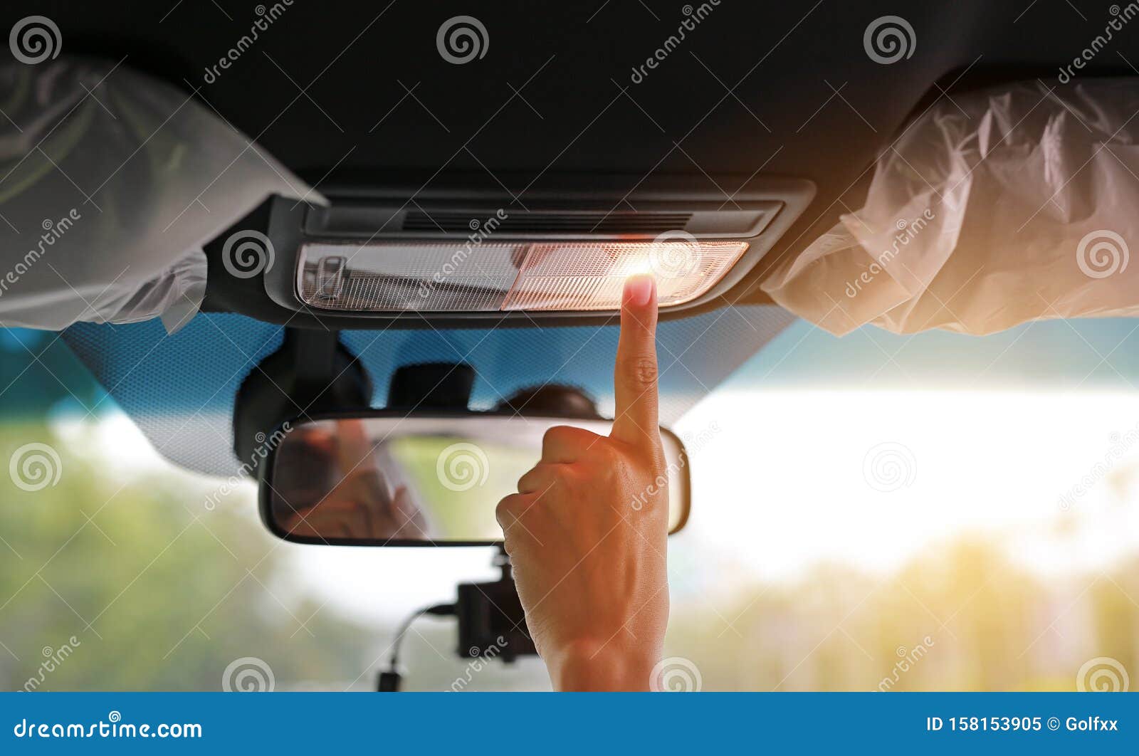 Hand Turning Light on Car Roof Light Stock Image Image of hand