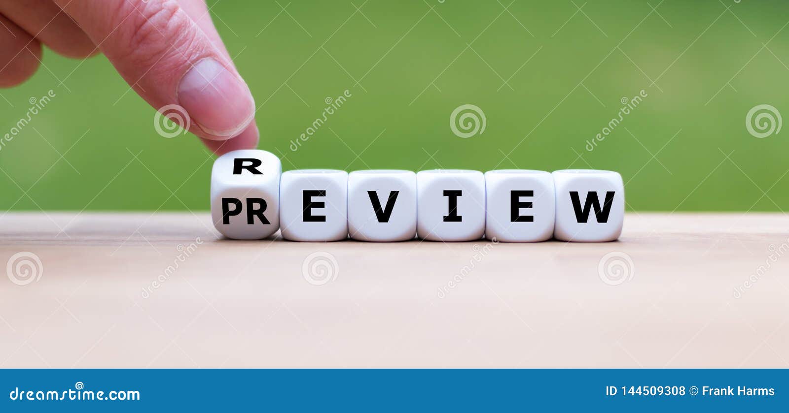 hand turns a dice and changes the word `review` to `preview`.