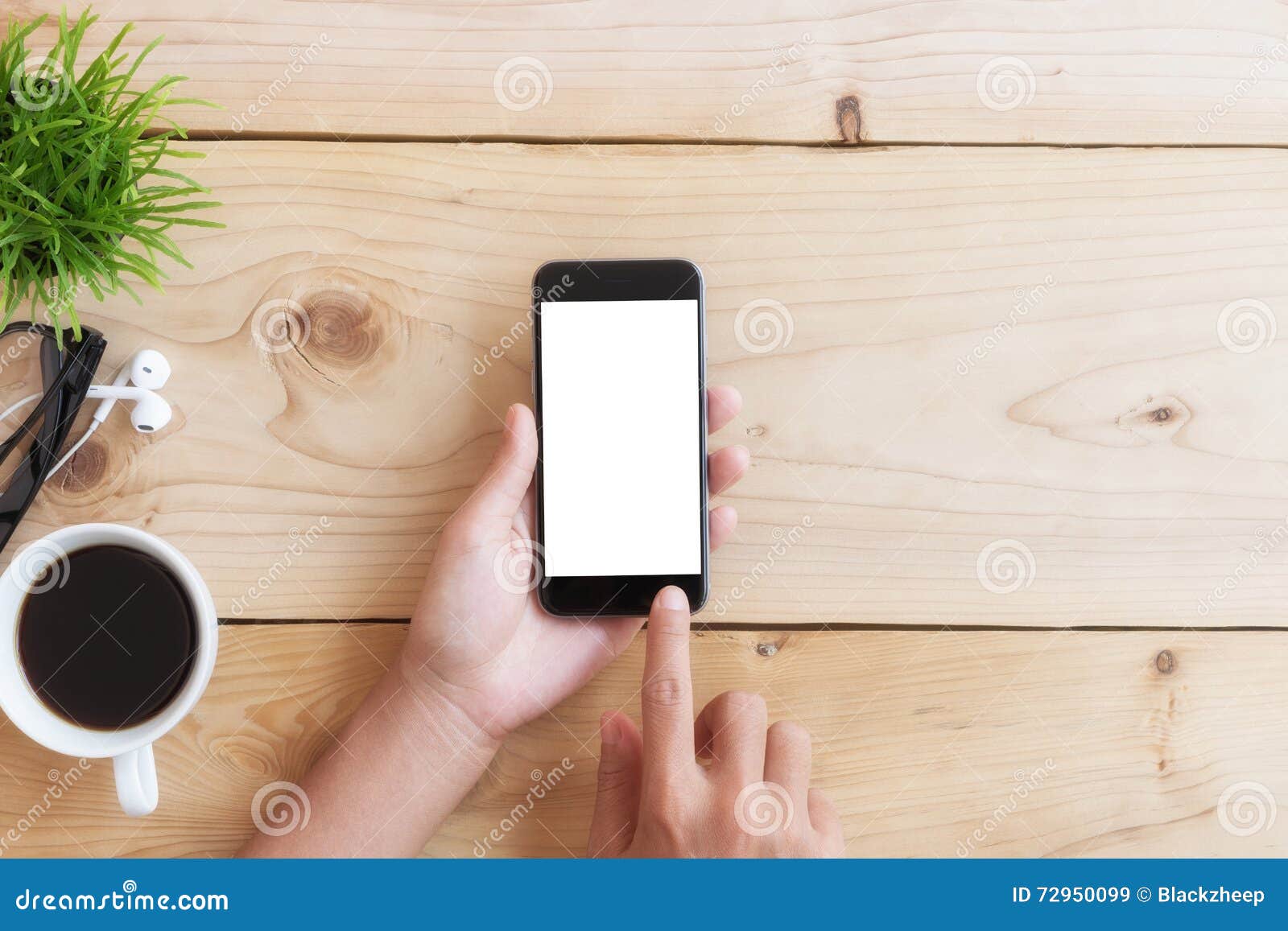 hand use phone on wood table