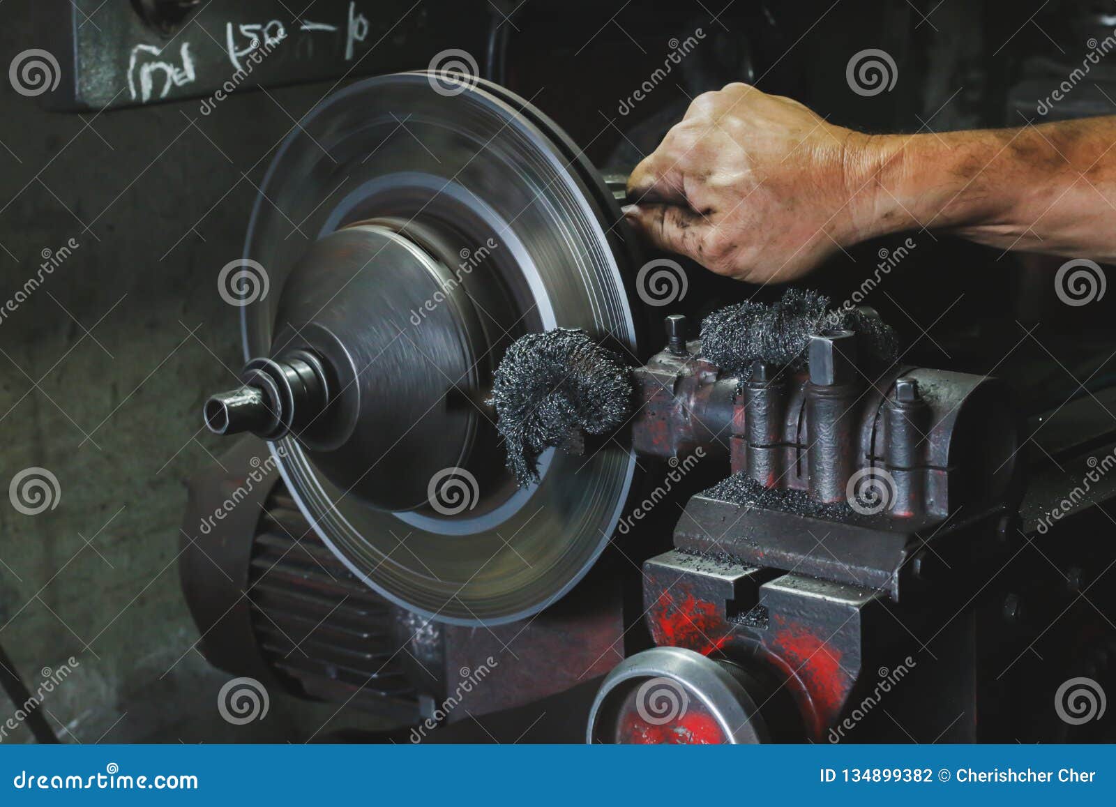 Hand Used Brake Disc Grinding Machine . about Car Brake Stock Photo