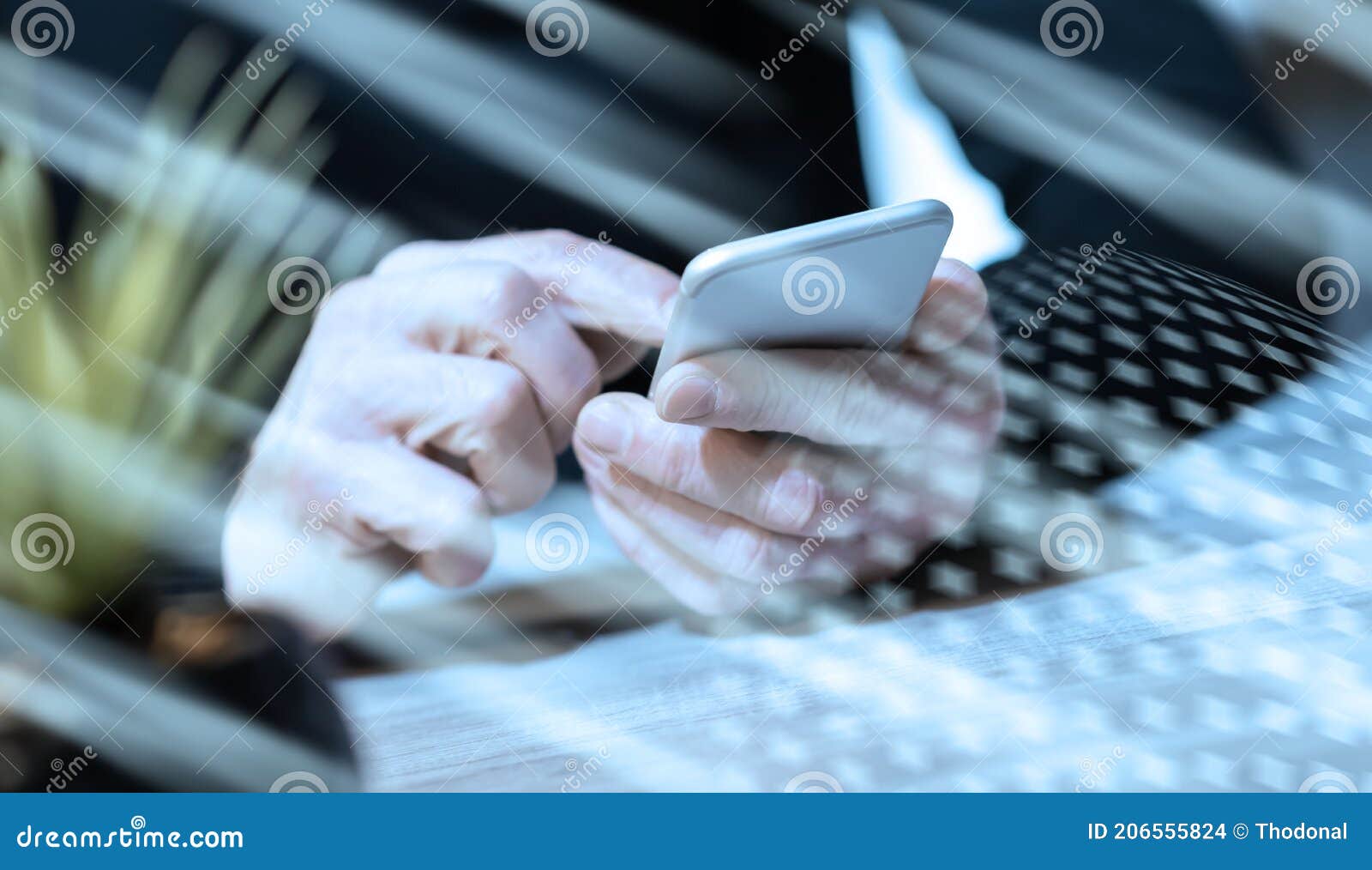 Hand Using Mobile Phone; Light Effect Stock Photo Image of