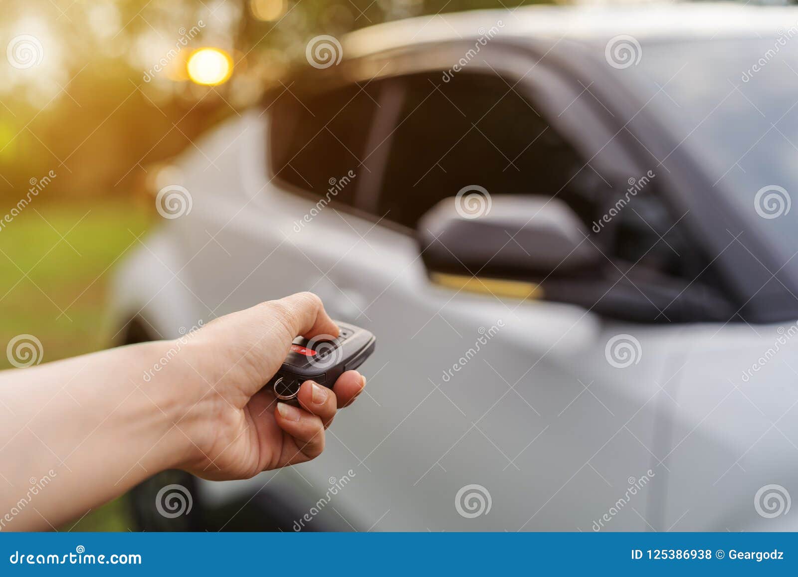 Hand Using Remote Key To Unlocked Car Stock Photo Image of ignition