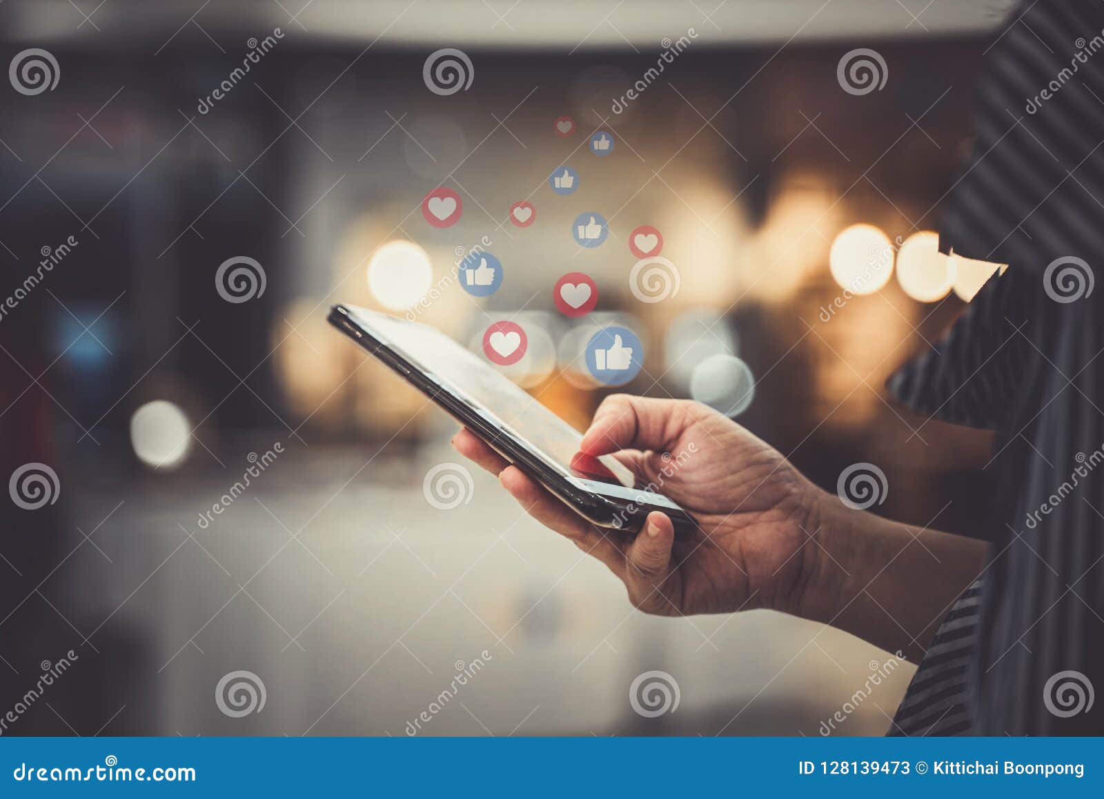 hand using smartphone with social media concept