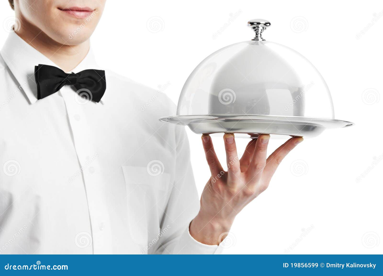 hand of waiter with cloche lid