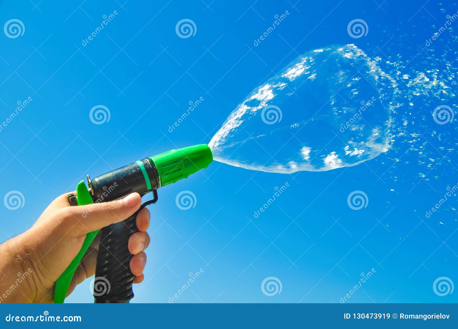 Water spray jet stock image. Image of flow, hand, drop 130473919