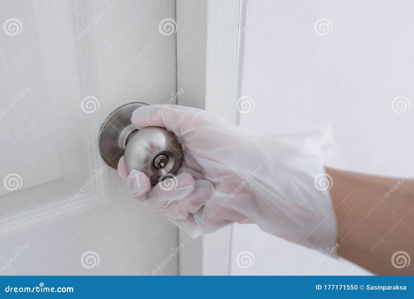 Hand Wearing Plastic Glove Open the Door, Protecting from Bacteria and