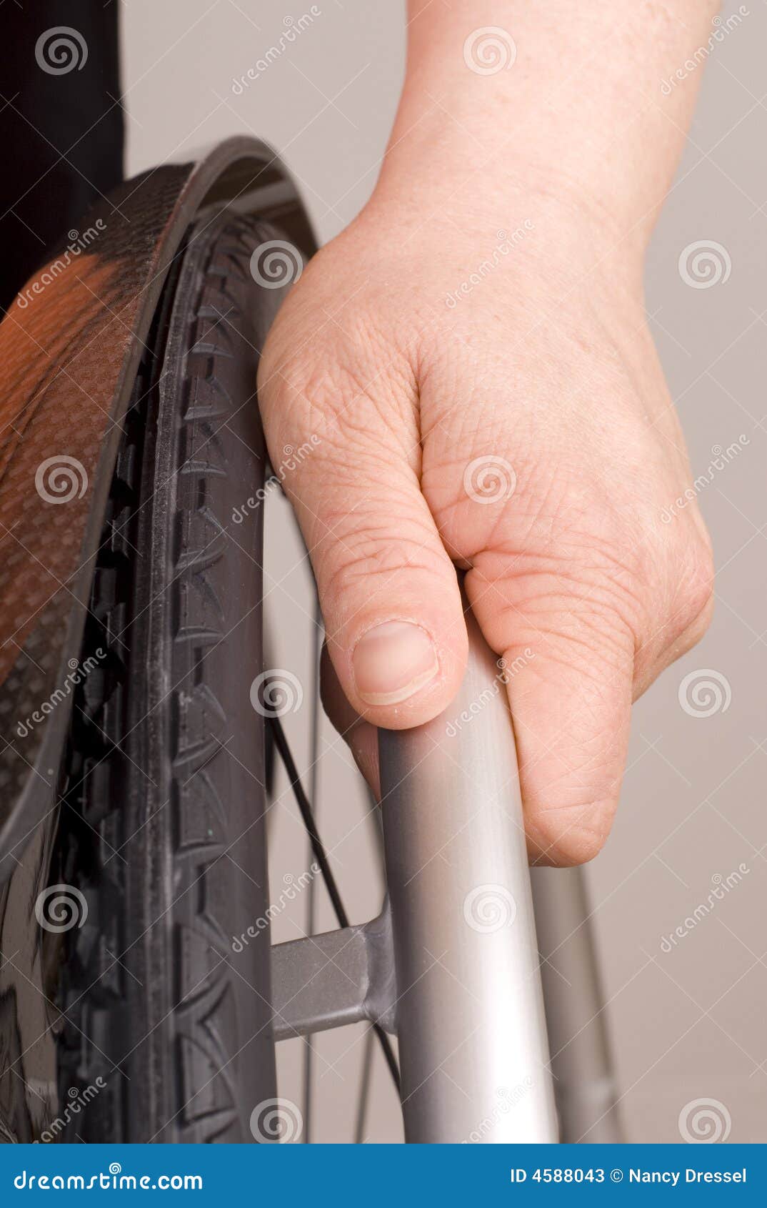 Hand on a wheelchair stock image. Image of illness, feet 4588043