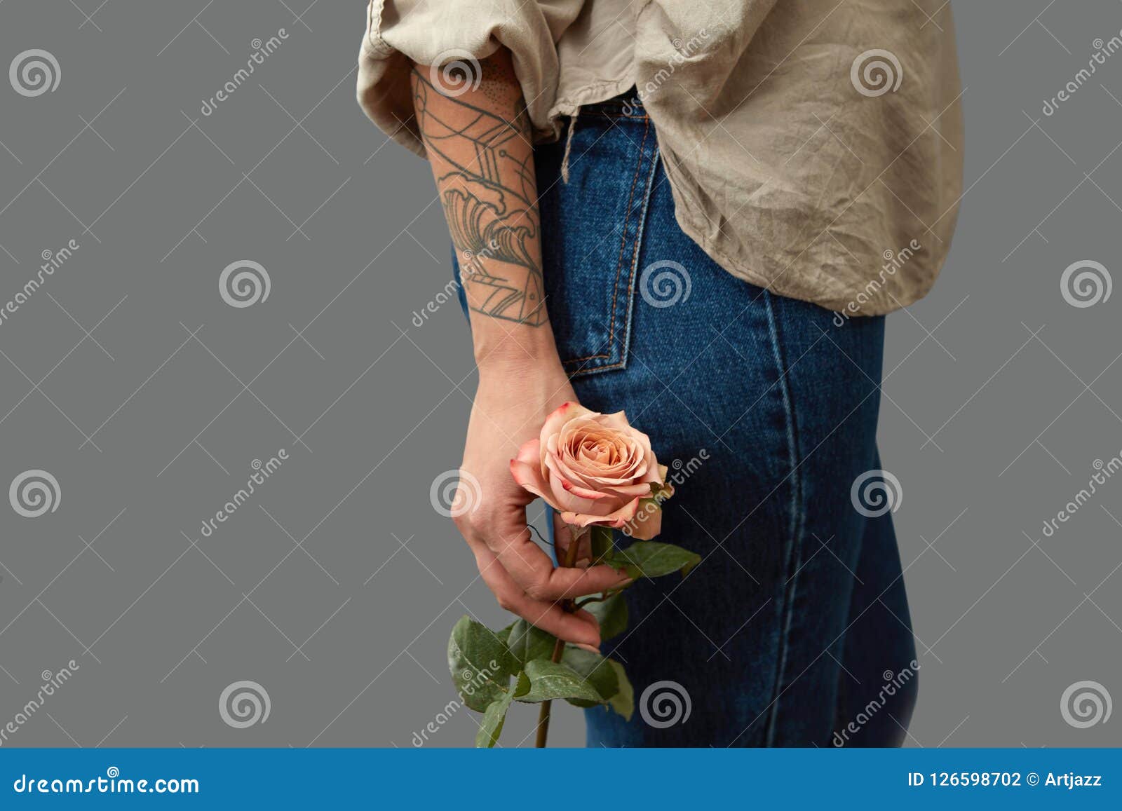 Premium Photo  Tattooed hand with a rose