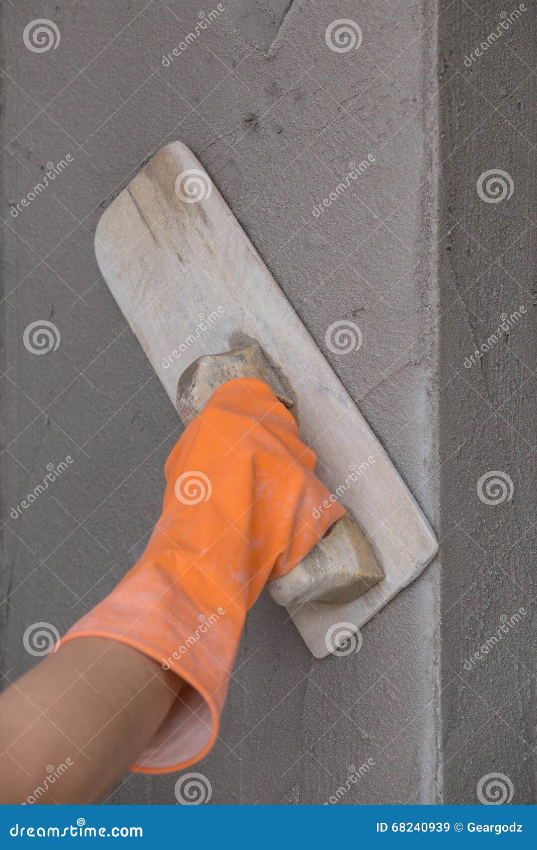 Hand of Worker Use Trowel Plastering Concrete at Wall Stock Image