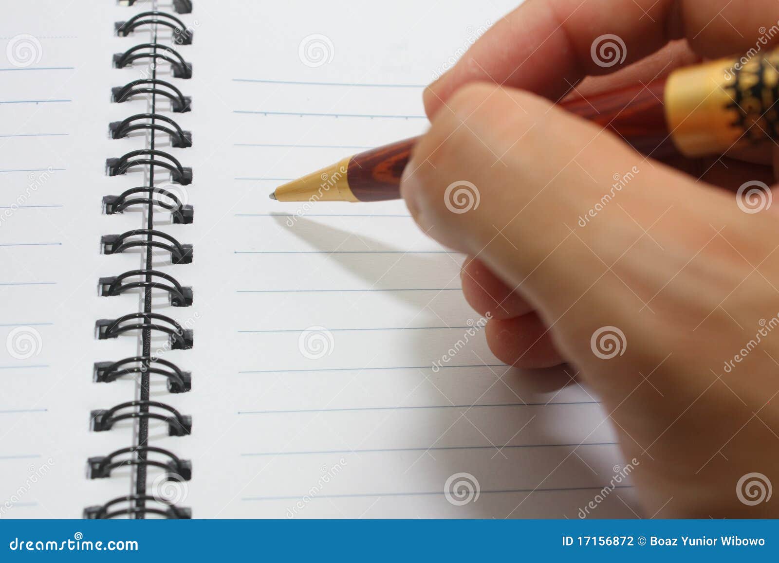 hand writing on notebook