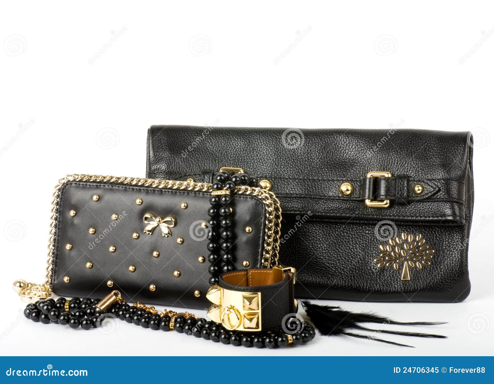 Handbag and golden jewelry stock image. Image of garment - 24706345