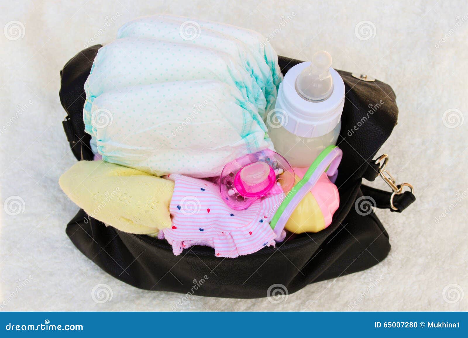 Handbag with Items To Care for Child Stock Photo - Image of apparel ...