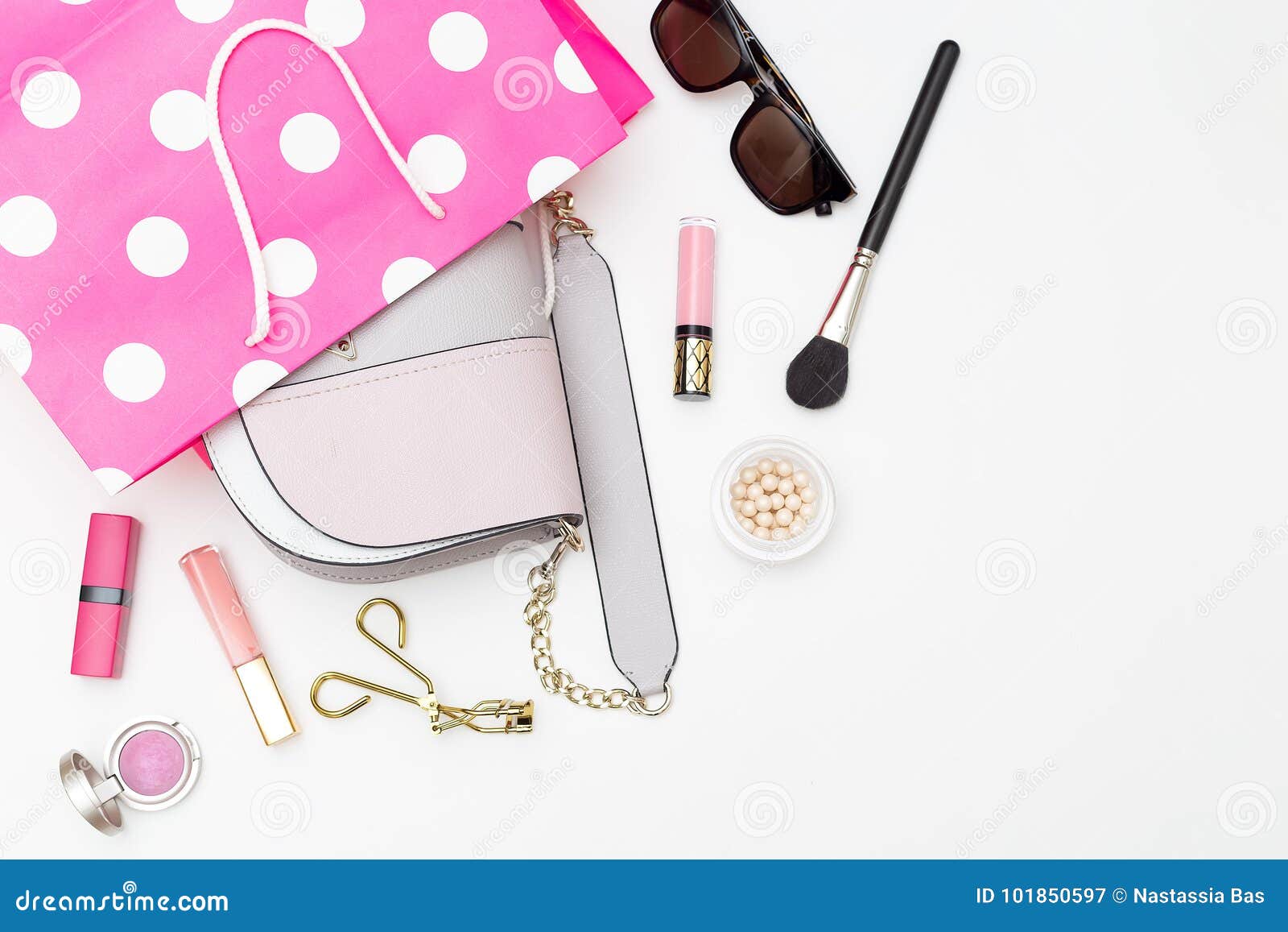 Handbag in a Shopping Bag and Cosmetics on a White Background. F Stock ...