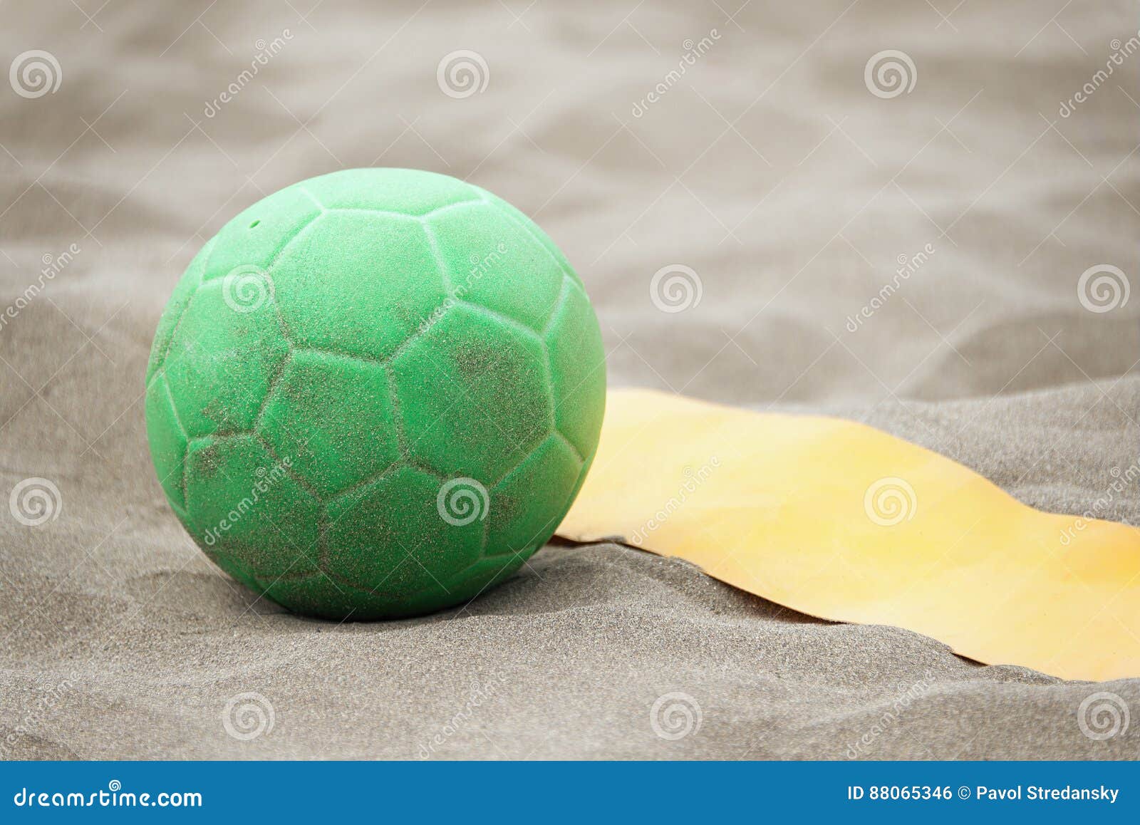 Handball ball on the beach stock photo. Image of green 88065346
