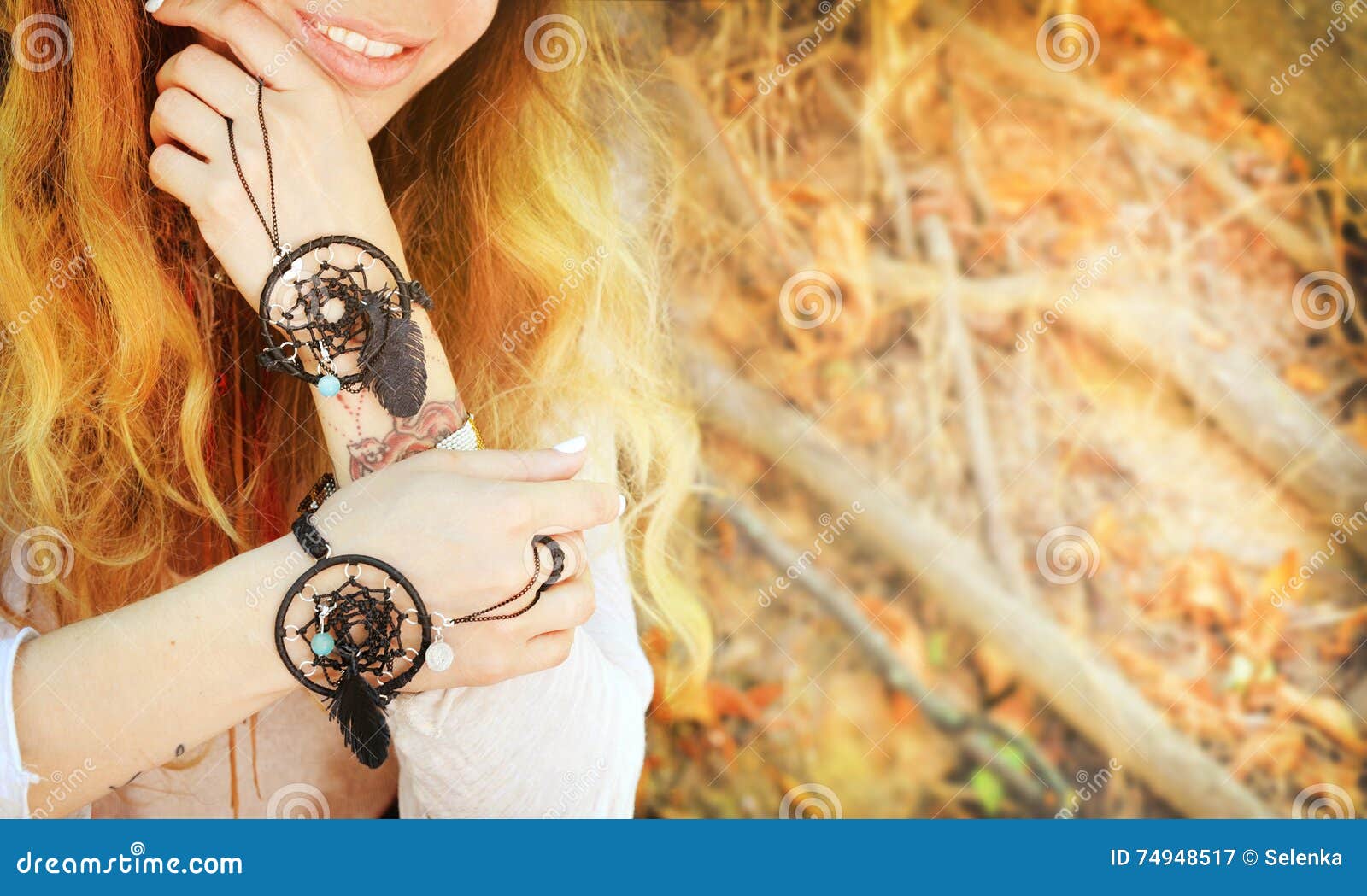 handcrafted bracelets on a woman hands, dreamcatcher jewelry, close up