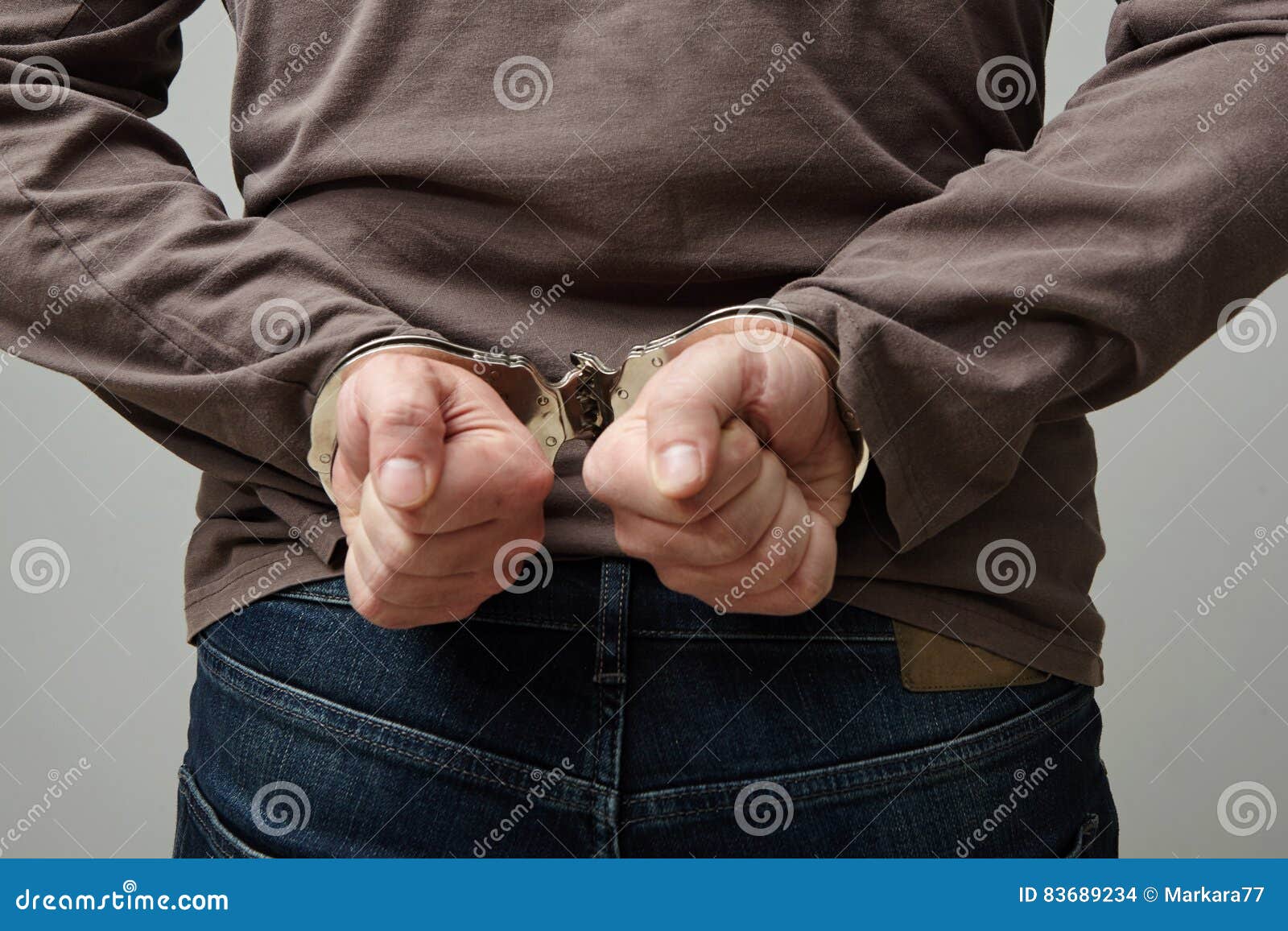 Handcuffed man. stock photo. Image of human, person, prison 83689234