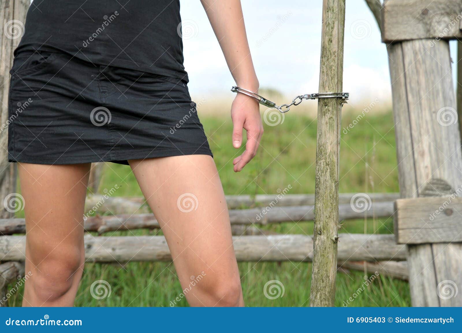 Handcuffs stock image. Image of knee, legs, woman, black 6905403