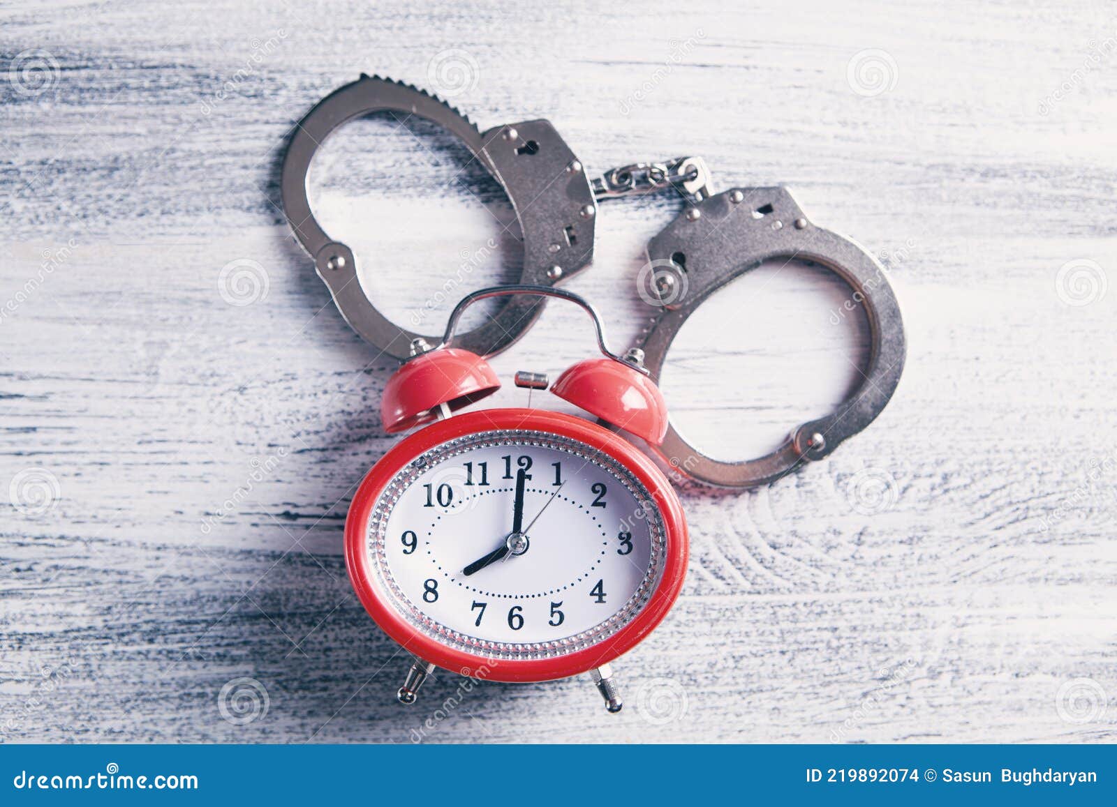 Handcuffs with Alarm Clock. Time Released Stock Photo Image of guilt