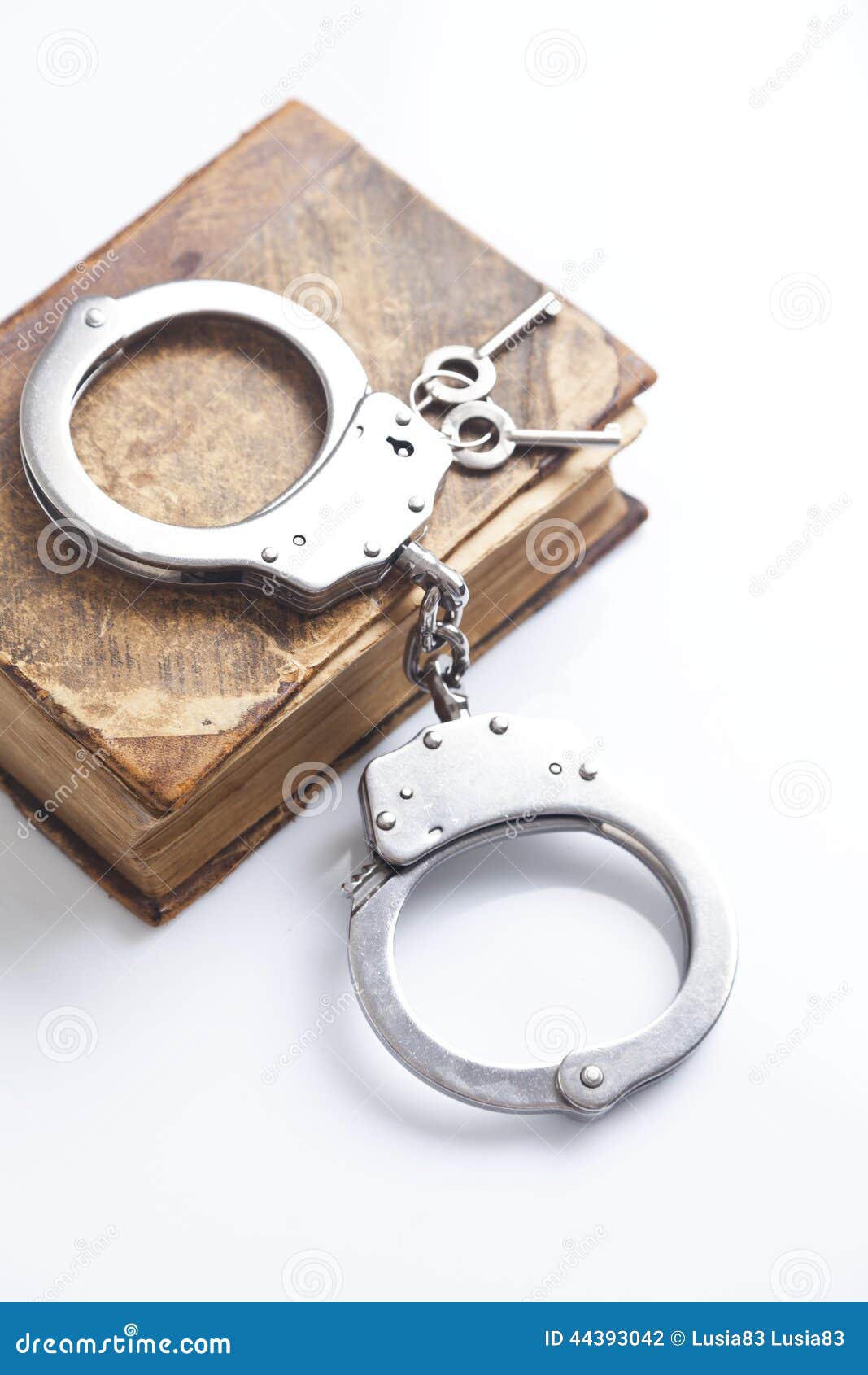 Handcuffs and book of law stock photo. Image of justice 44393042