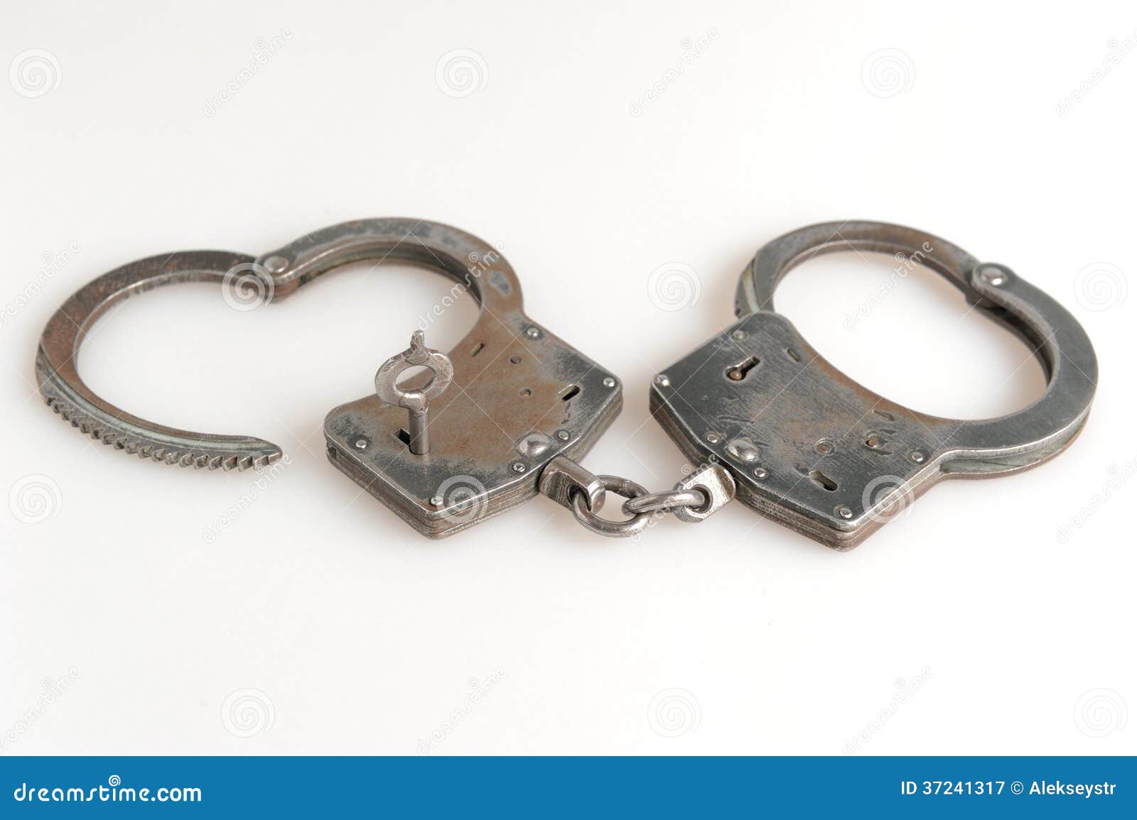 Handcuffs in Heart Shape and Key within Isolated Stock Image Image of