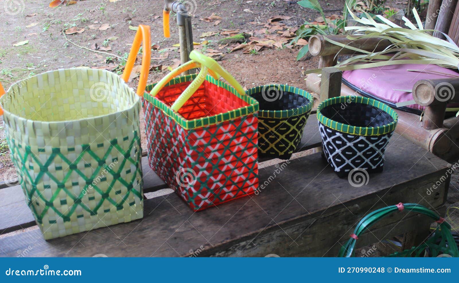 handicraft, basket made manually from plastic rope waste leather.