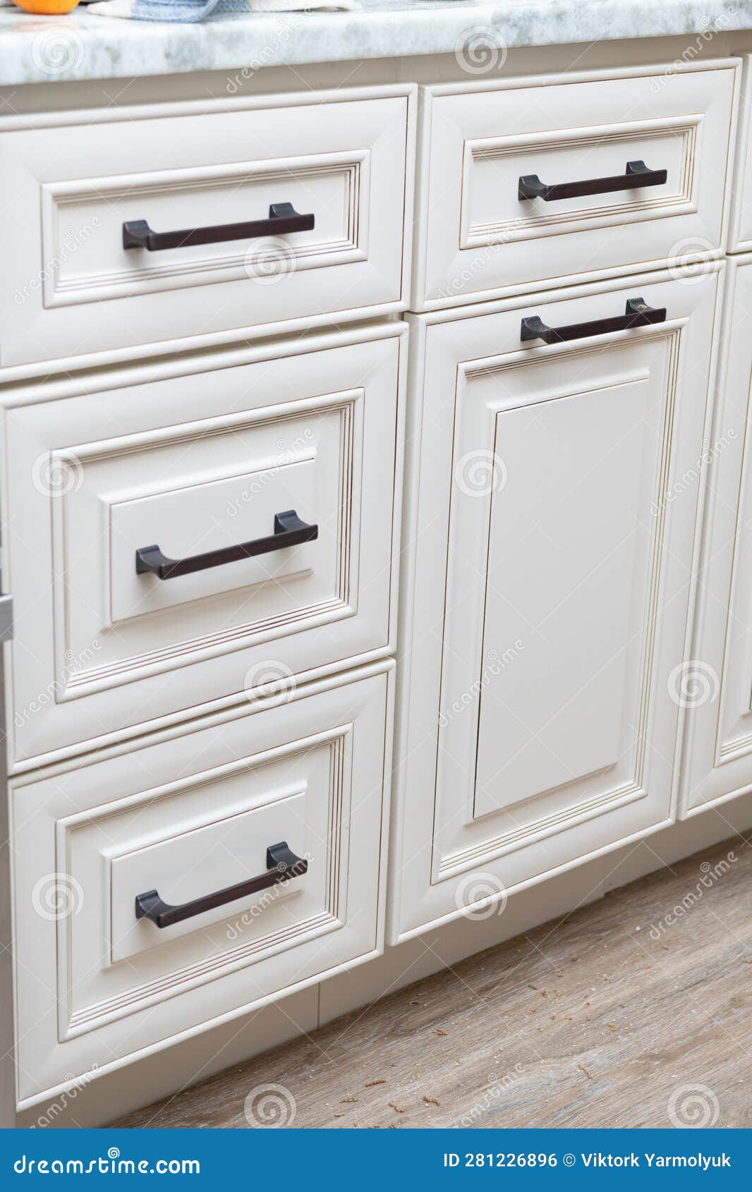 Handle Installation Drawers in Custom Kitchen Stock Photo