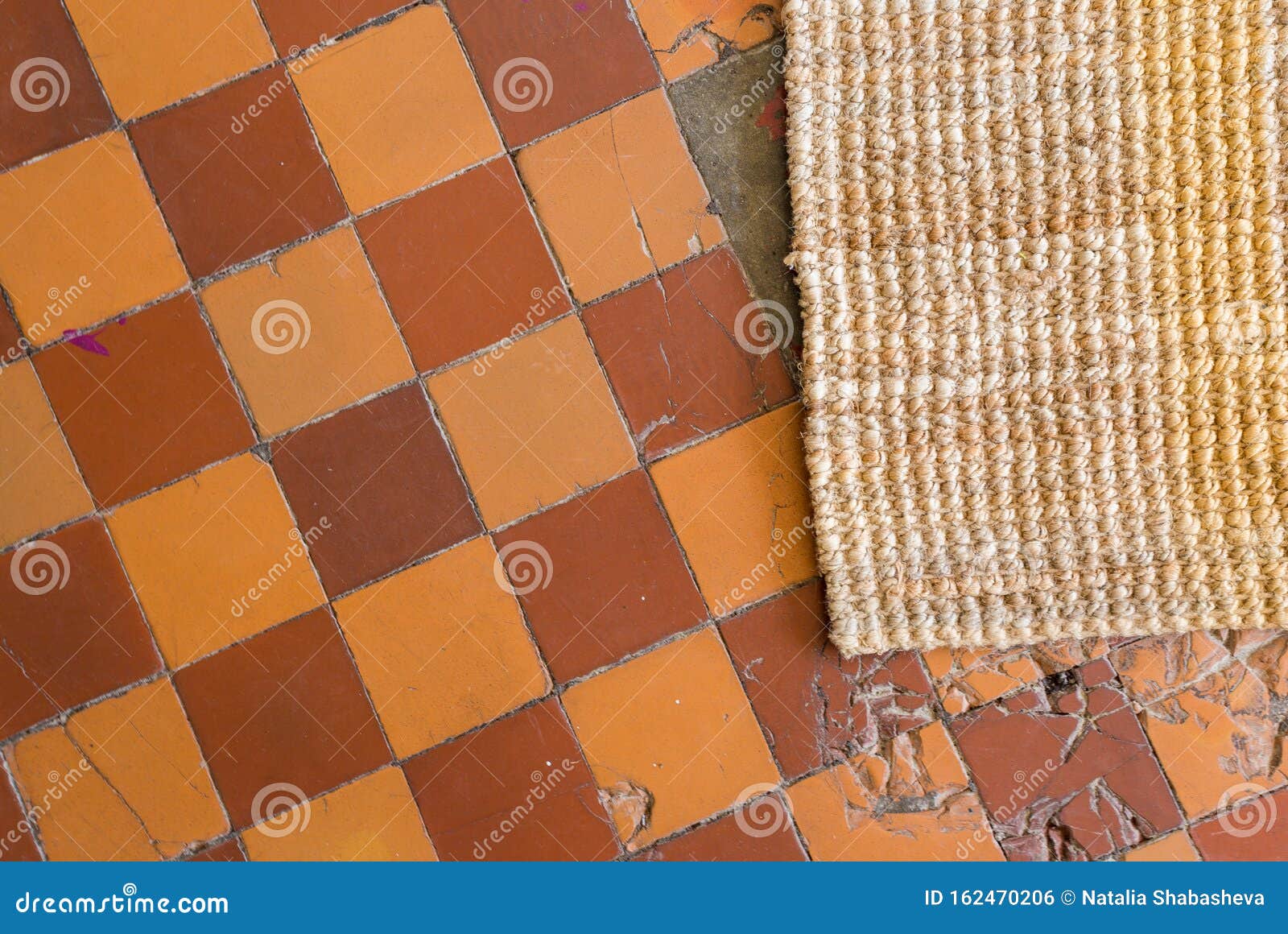 Handmade Carpet on Tiled Checkered Floor, Carpet on the Floor Stock