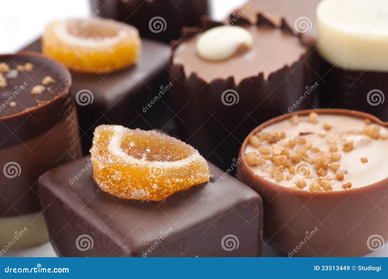 Handmade Chocolate Candies With Yellow Shining Coating With Red Drops