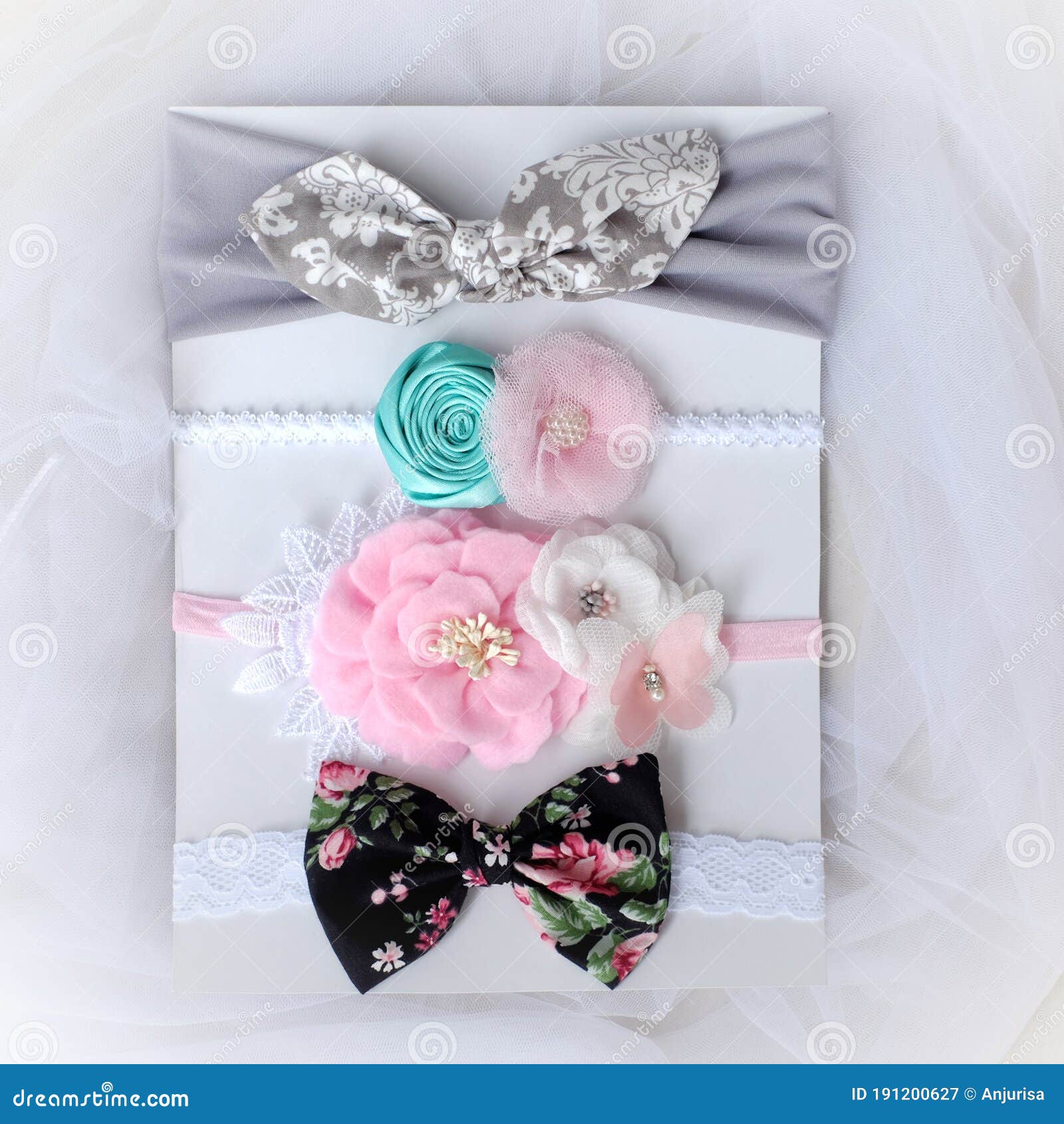 Four Pieces of Handmade Hair Accessories with Unique Design Placed on White  Tulle Fabric Stock Image - Image of color, bouquet: 191200627