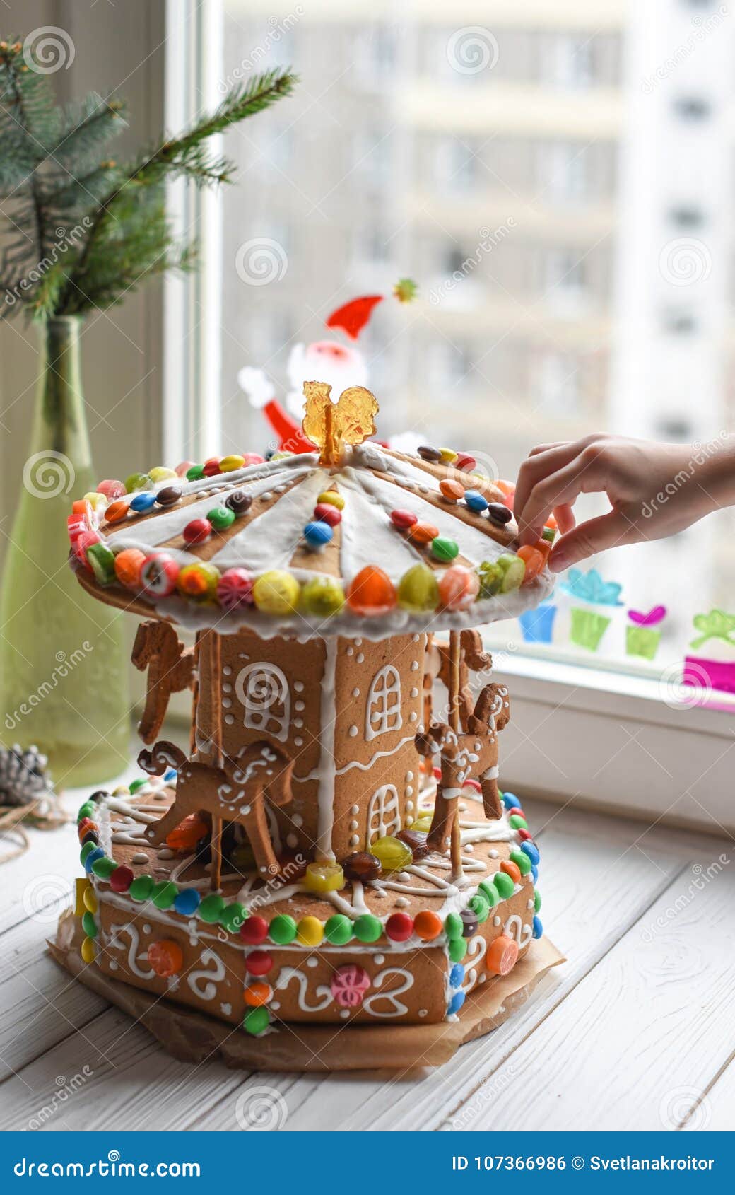 A Gingerbread Carousel and Some Christmas Decoration Elements on a ...