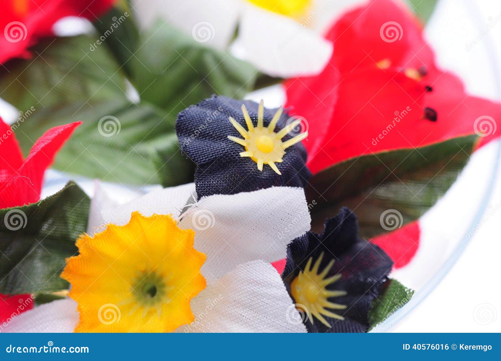 Close up of handmade ornament Flowers on white background.