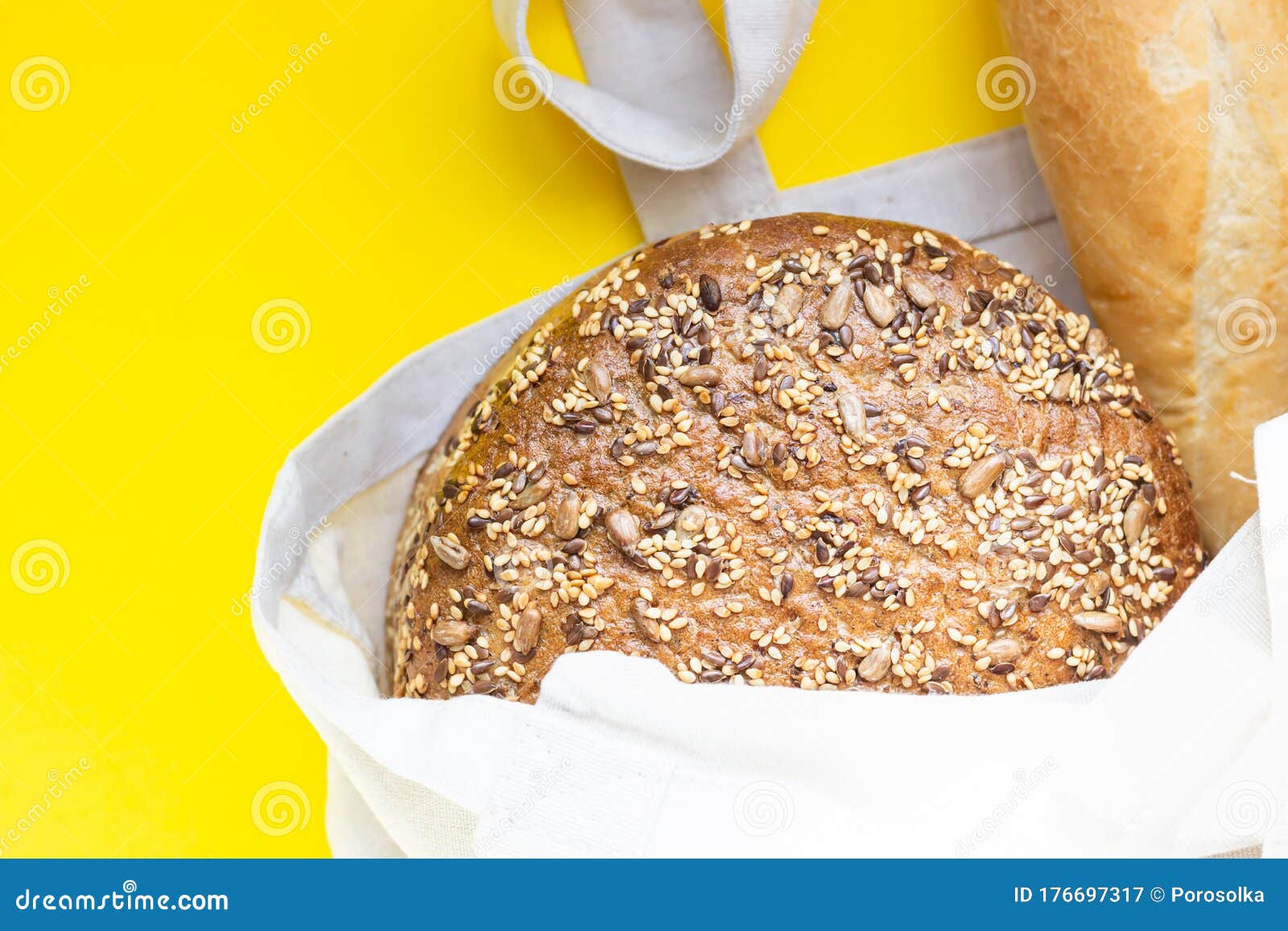 Download Handmade Reusable Cotton Textile Shopping Bag With Fresh Bread On A Yellow Paper Background Stock Image Image Of Organic Fresh 176697317 Yellowimages Mockups