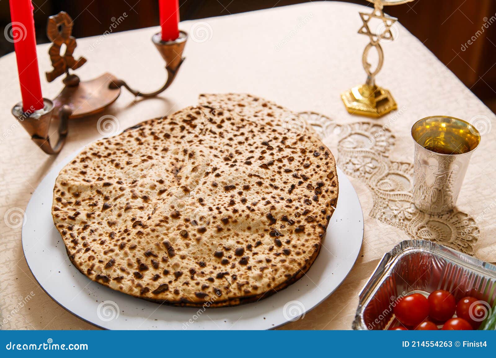 Handmade Shmura Matzah on a Plate on the Seder Pesach Table. Stock
