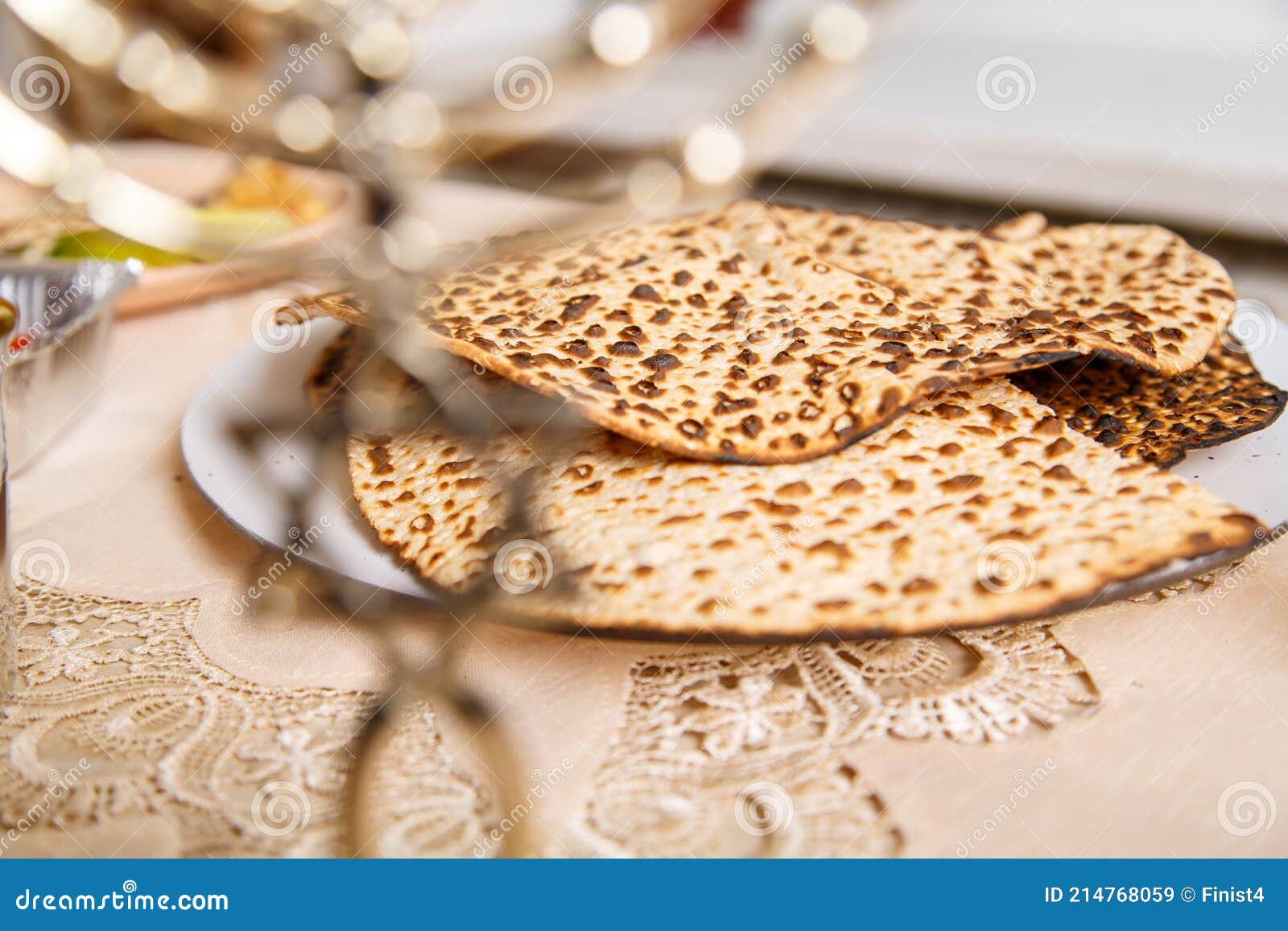 Handmade Shmura Matzah on a Plate on the Seder Pesach Table. Stock