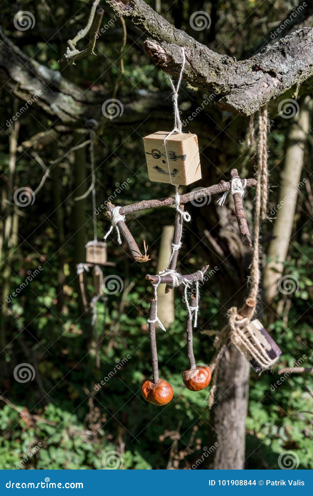 Handmade Wooden Figurines on a String. Stock Photo Image of attached