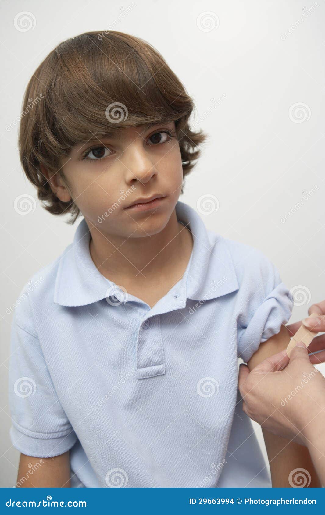 Hands Applying Bandage on Boy S Arm Stock Photo Image of patient
