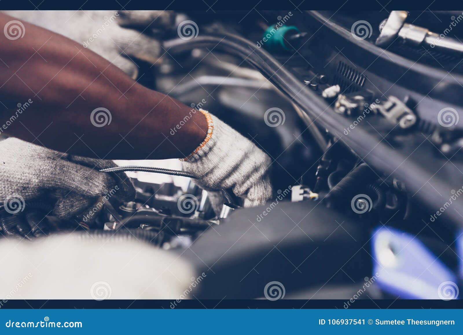 Hands of Auto Mechanic Repairing Car. Selective Focus. Stock Image