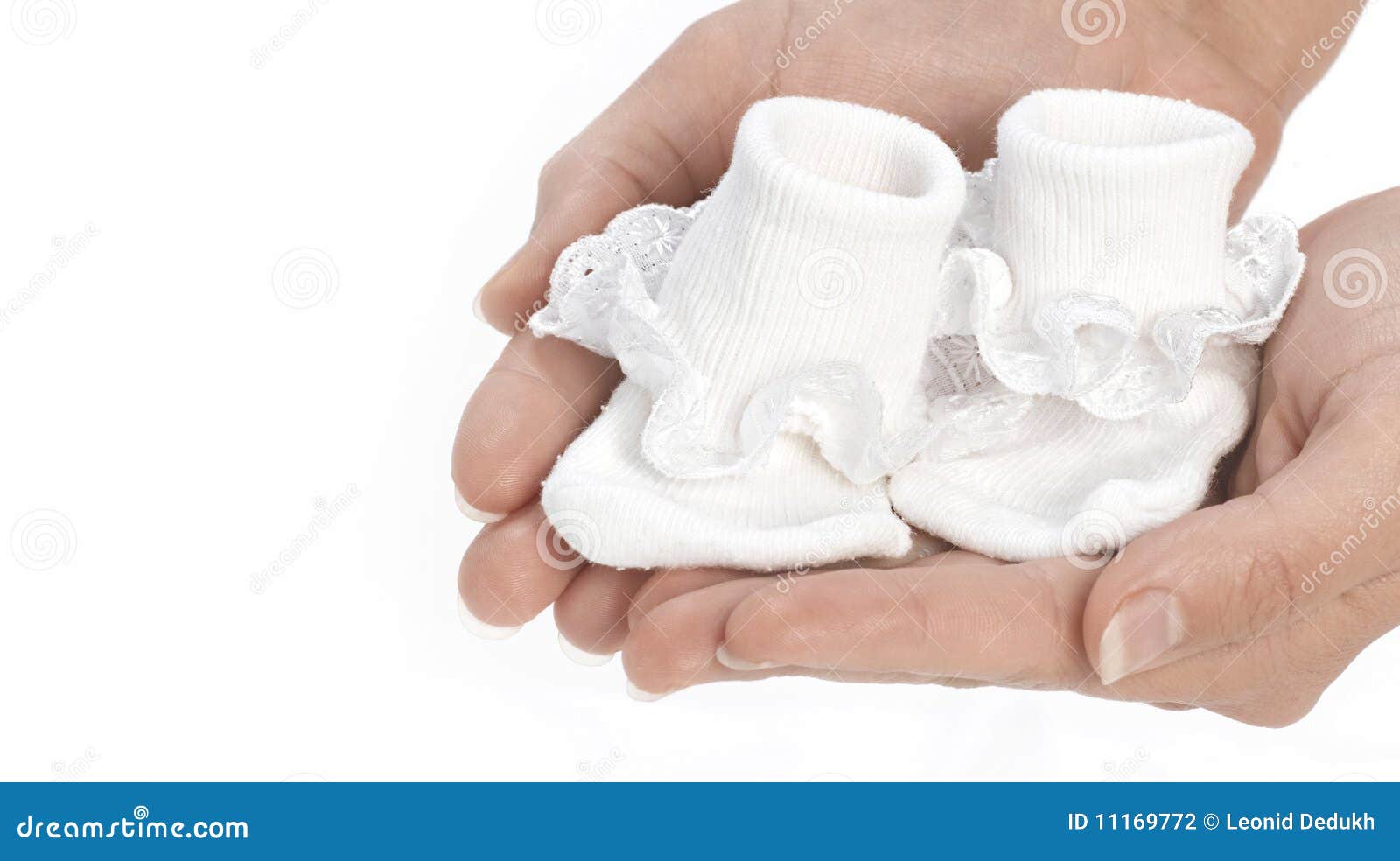 Hands with baby socks stock photo. Image of pair, baby 11169772