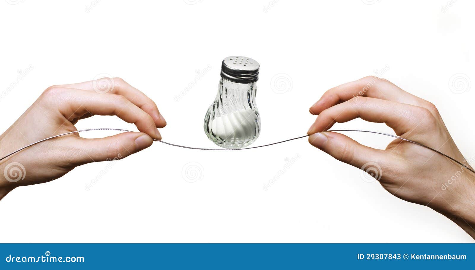 Hands Balancing Salt Shaker on Wire Stock Image Image of salt, white