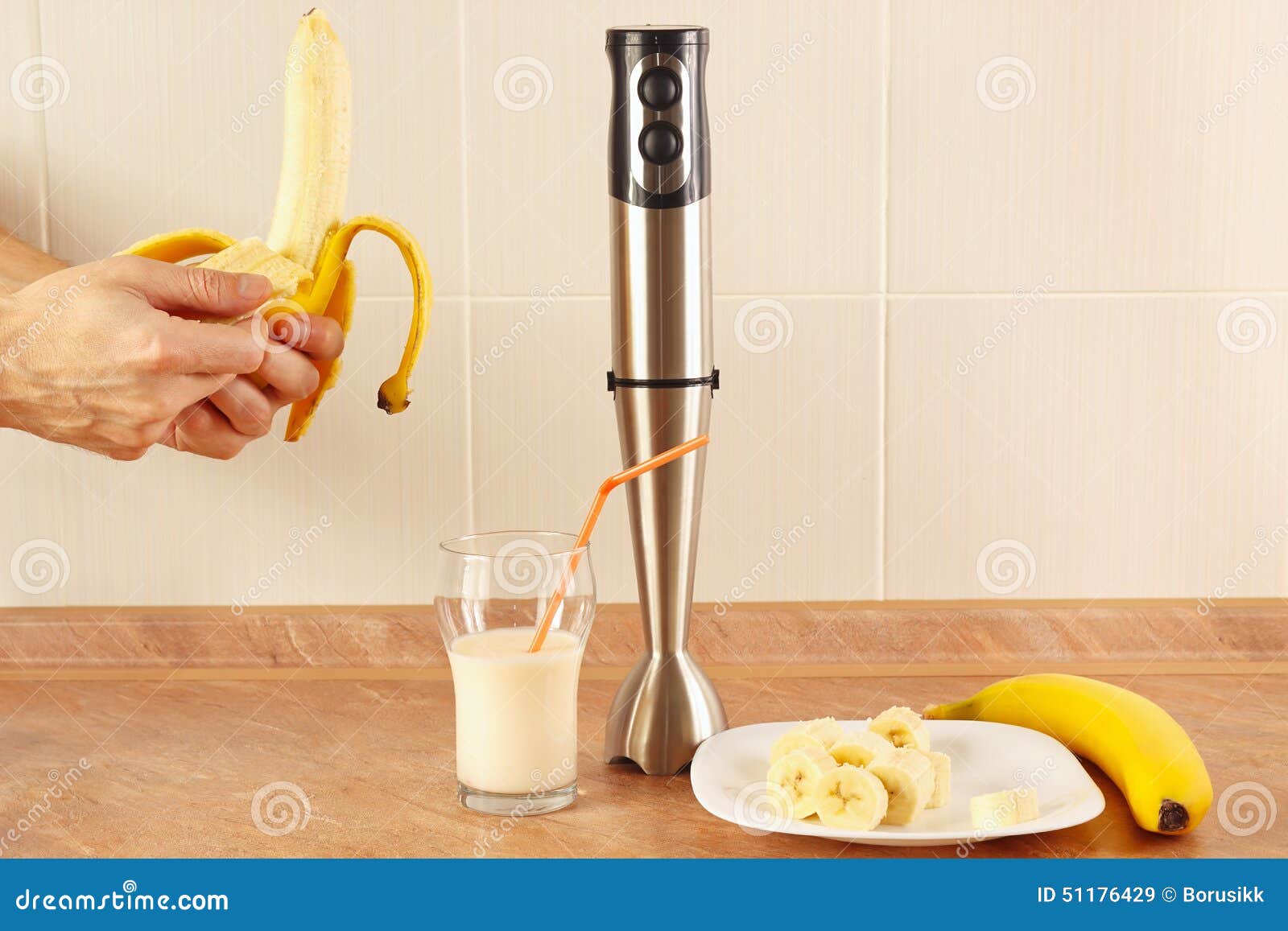 Hands Chefs are Peeling a Banana Next To Blender Stock Image Image of