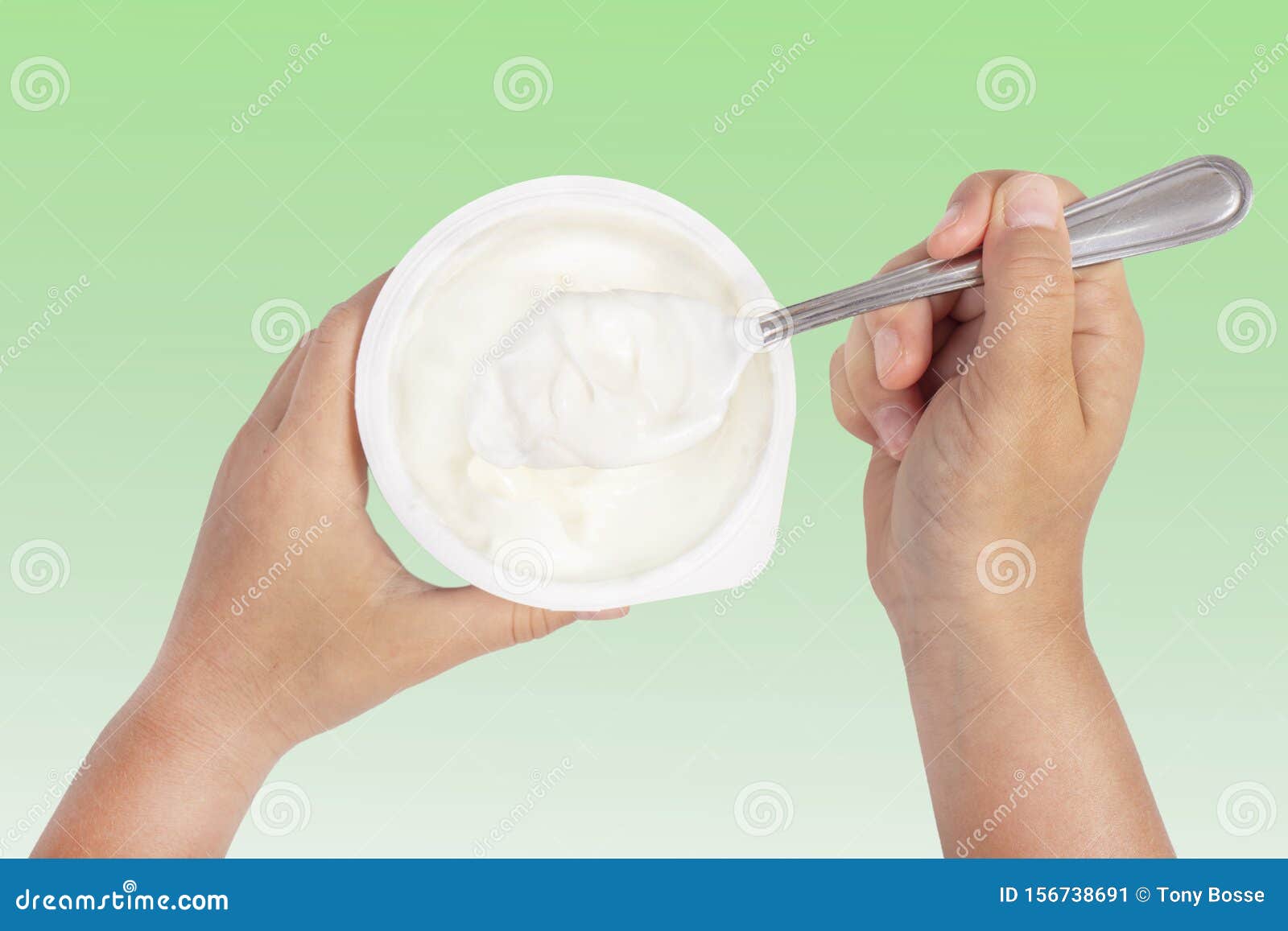 Child Eating Plain Yogurt stock image. Image of lifestyle 156738691