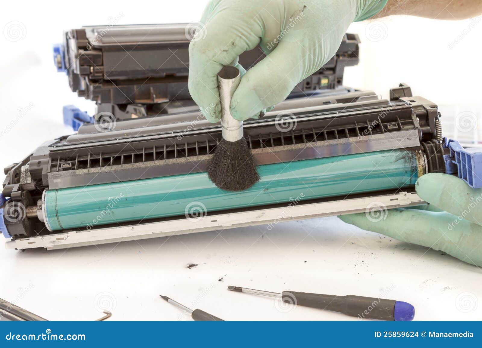 hands cleaning toner cartridge