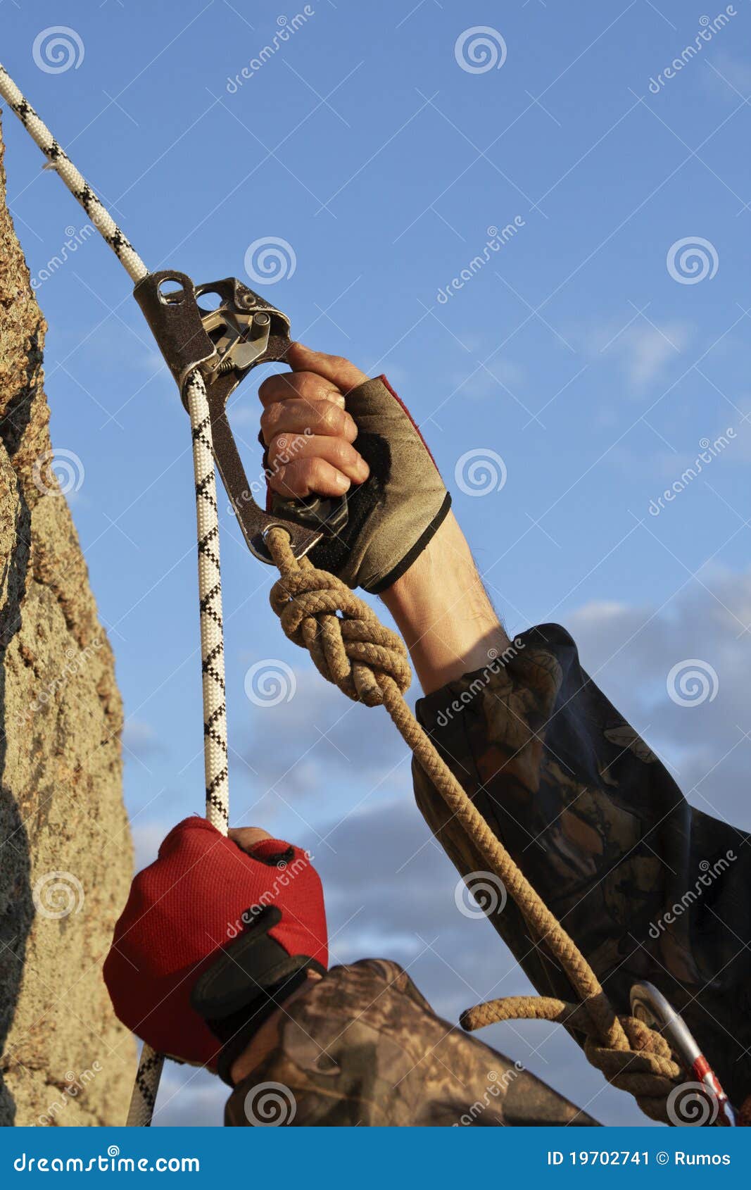 Hands of Climber I Work with Equipment on Rock. Stock Image Image of