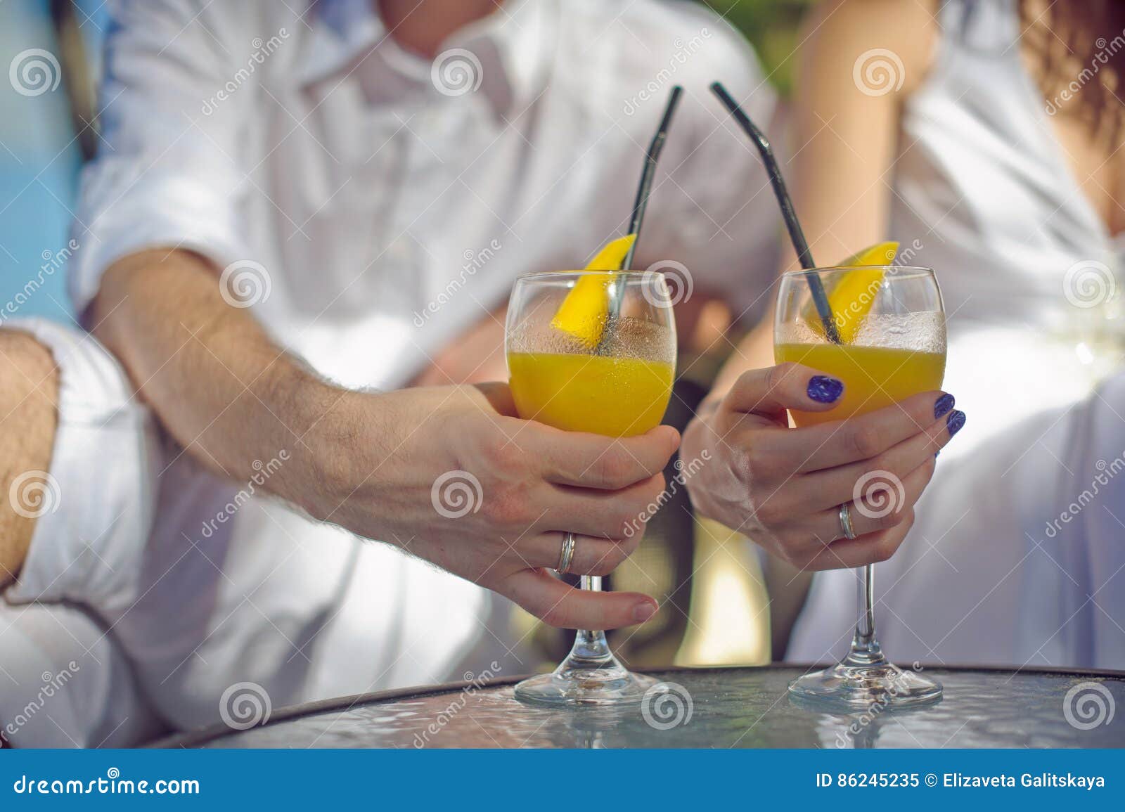 Hands with Colorful Cocktails on the Beach Stock Image Image of