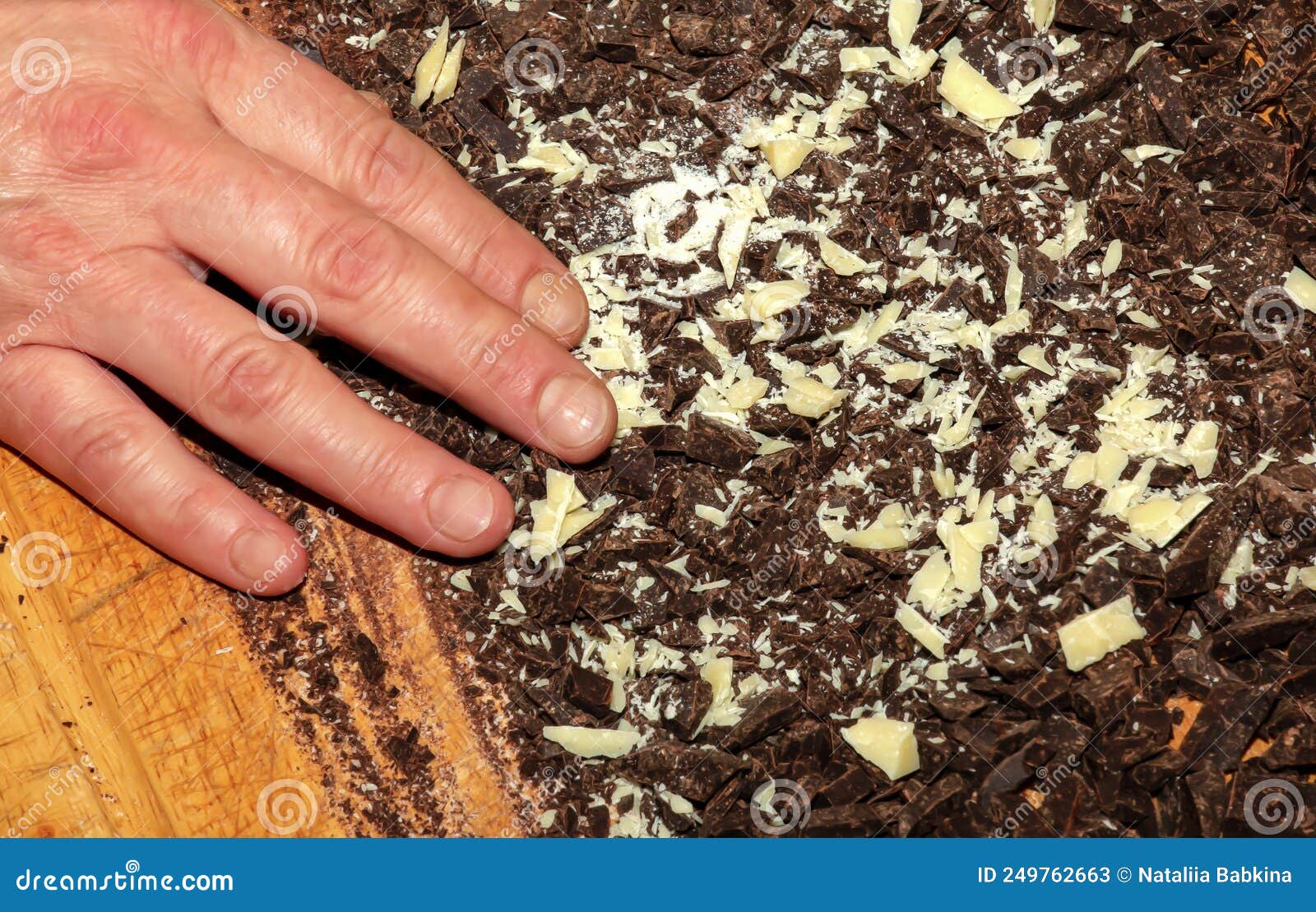 The Hands of the Cook Pour the Crushed Cocoa Butter and Grated Cocoa