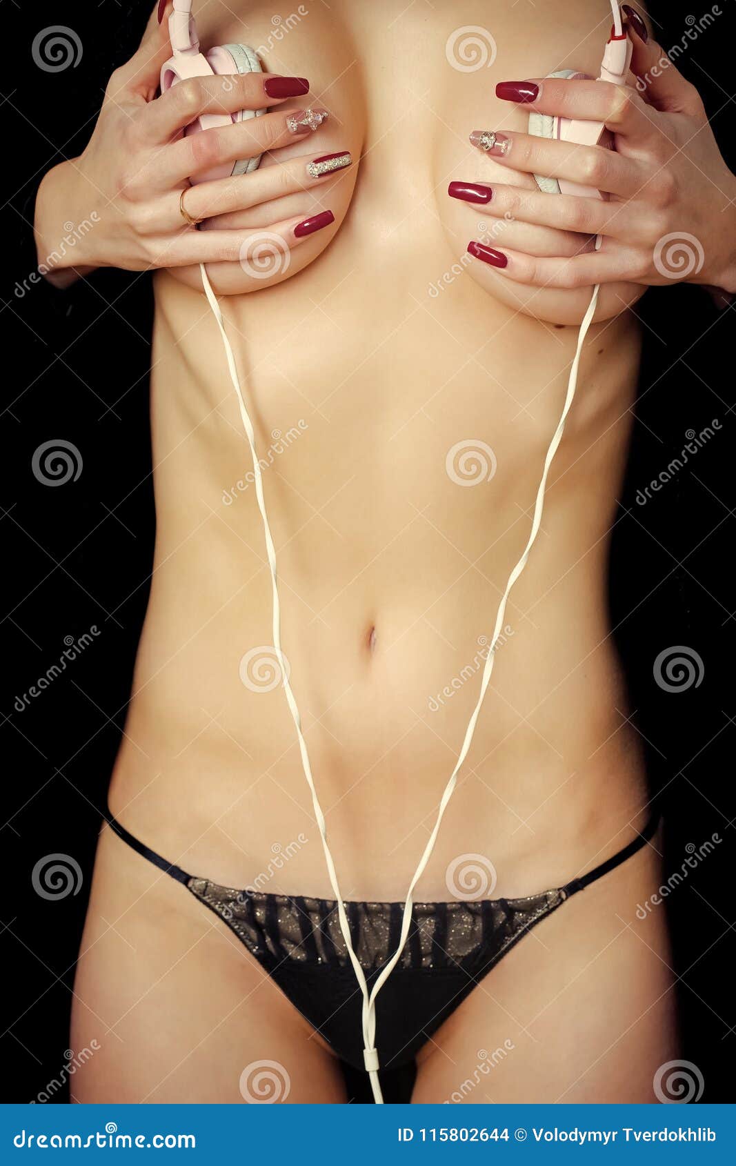 Hands Covering Naked Breast with Headphones Stock Photo - Image of body,  belly: 115802644