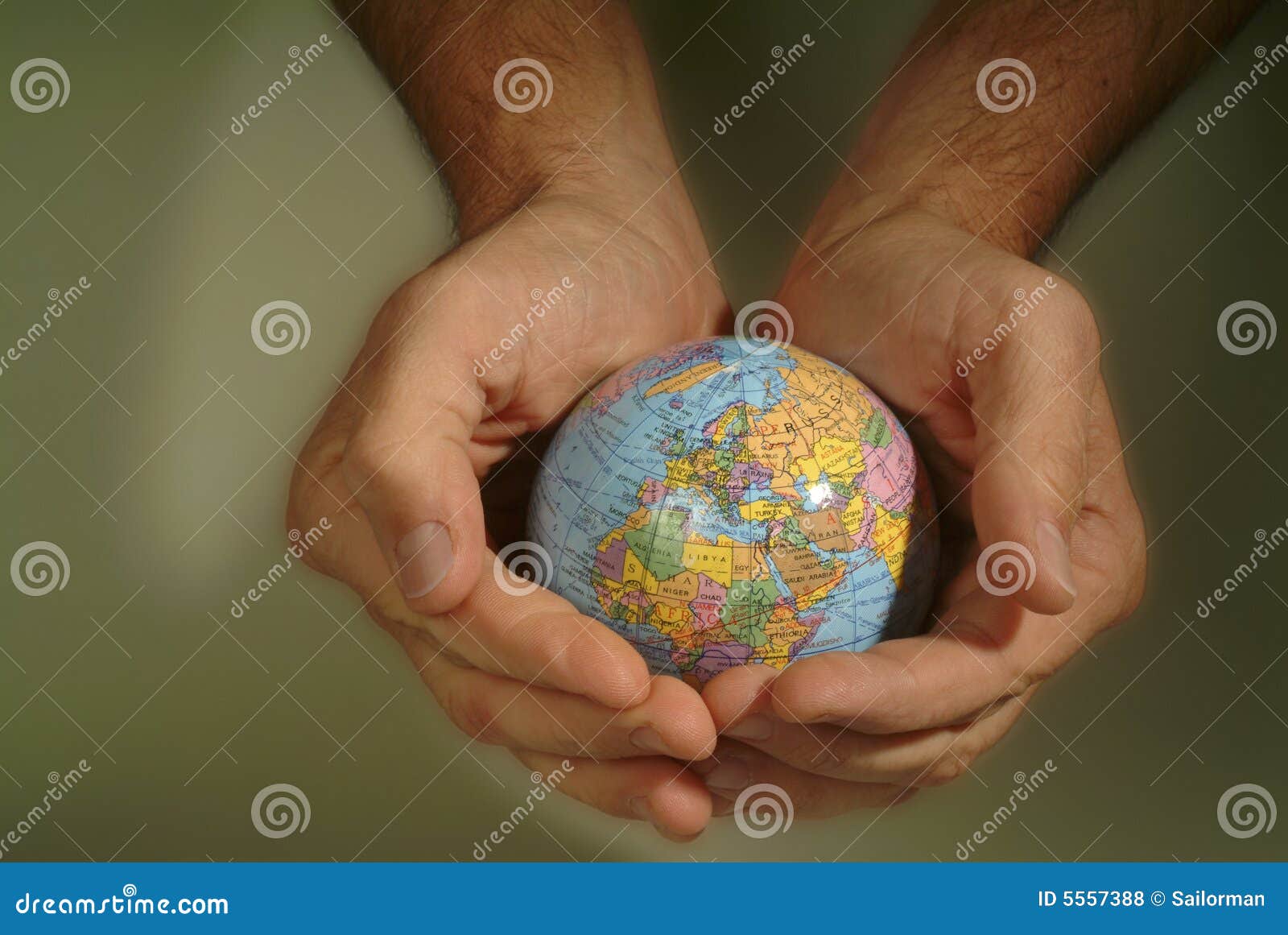 Hands cradle small globe stock photo. Image of oceans 5557388