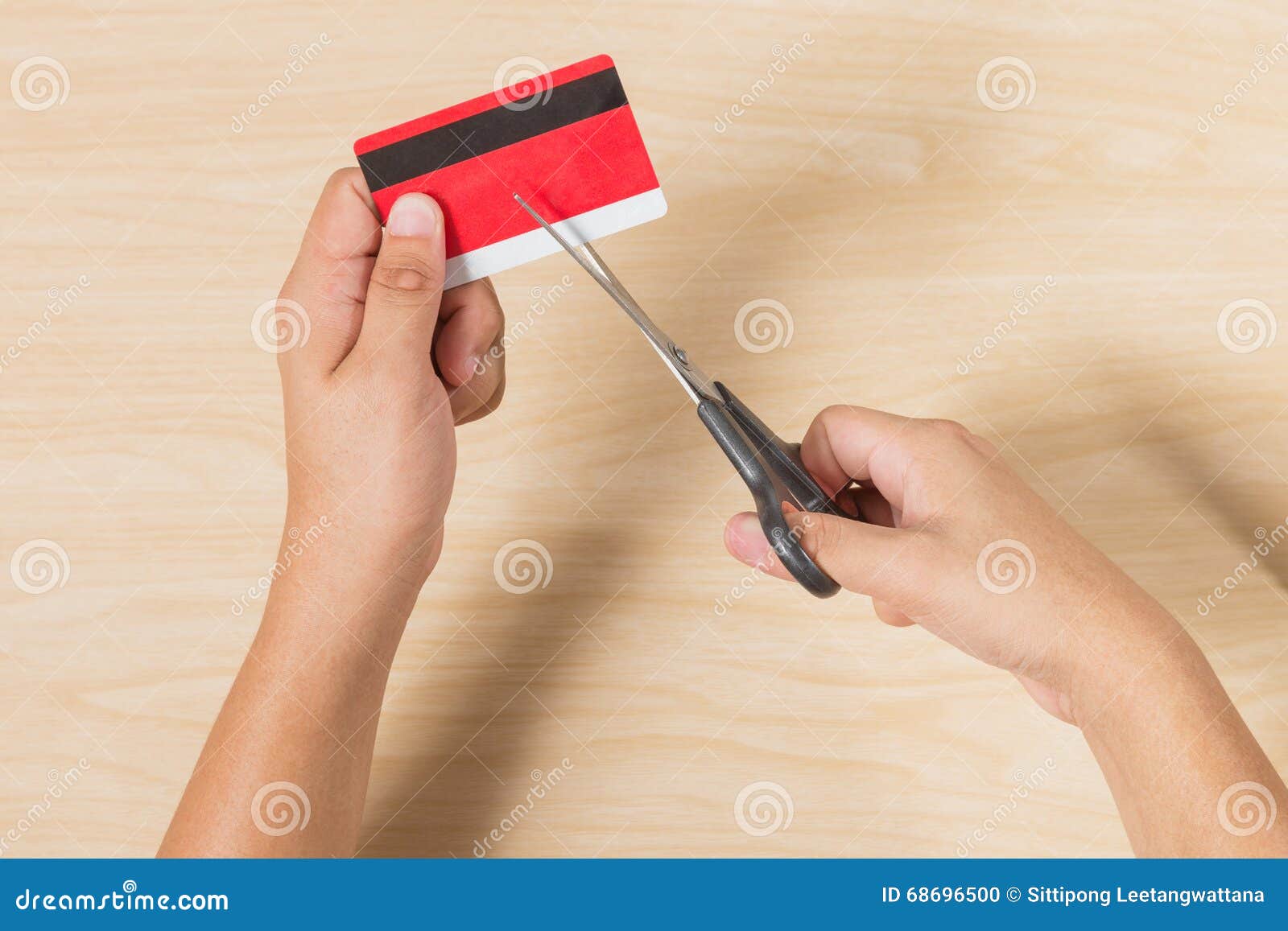 Hands Cutting a Credit Card with Scissors Stock Photo Image of debt