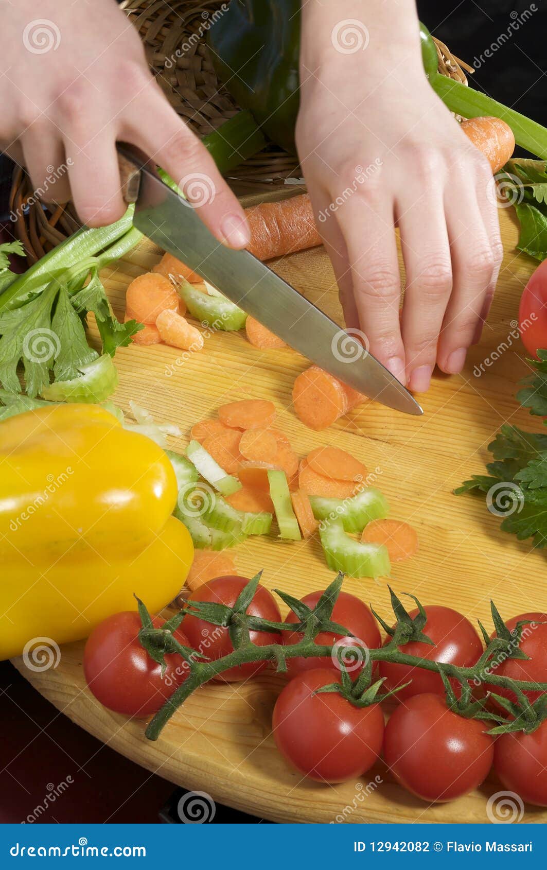 Hands cutting vegetables stock photo. Image of unrecognizable 12942082